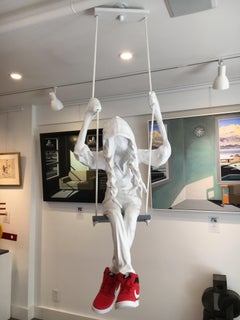 Suspended Ceiling Sculpture of a Girl on a Swing. Title - Girl on a Swing