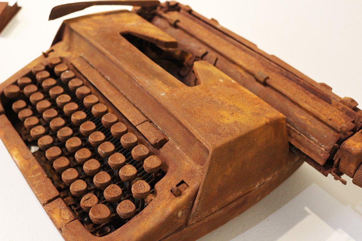 Paul Travis Phillips Figurative Sculpture - "rusted typewriter"  hand oxidized royal classic typewriter