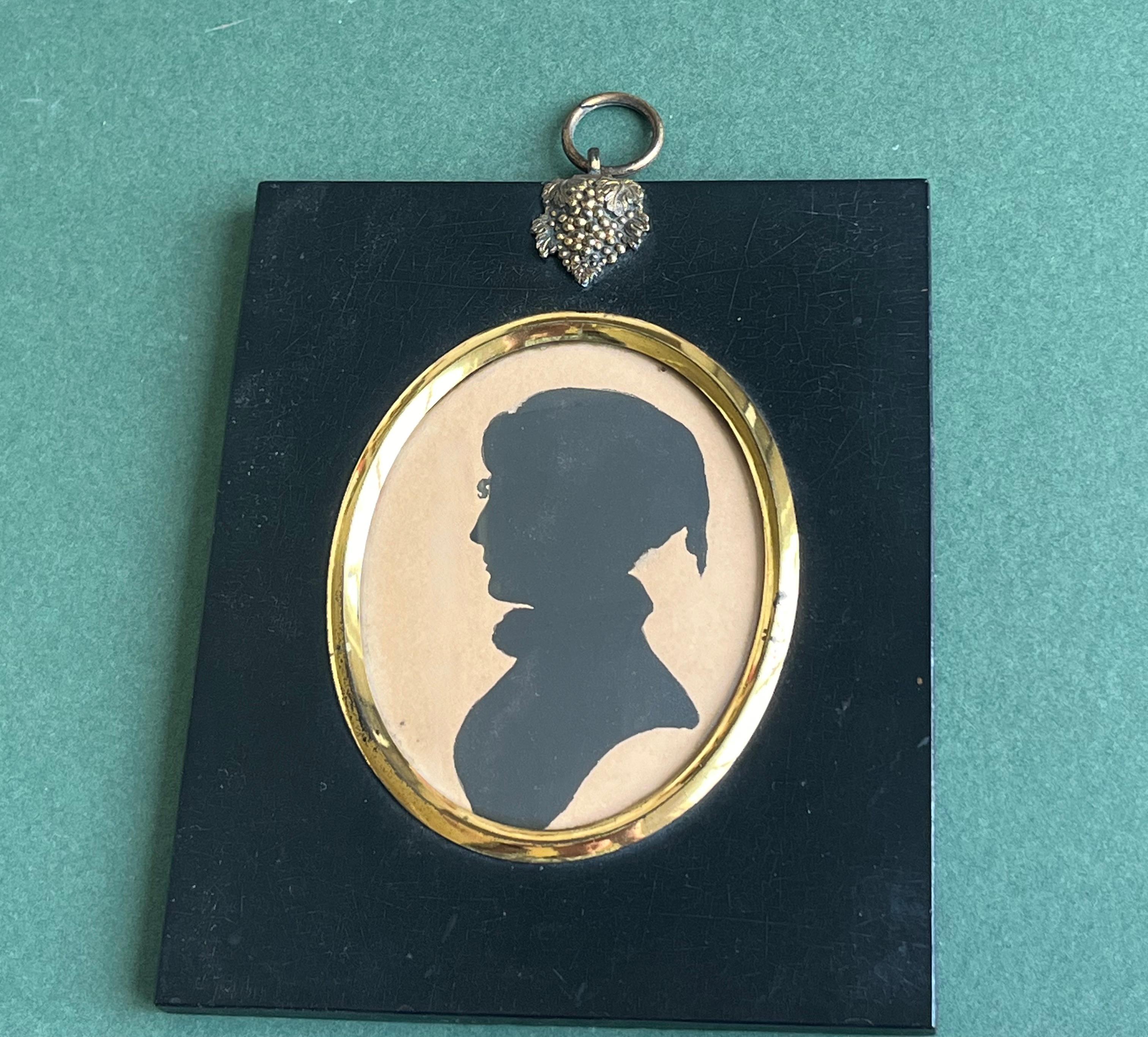 A very skillfully painted ink on paper silhouette, unusually with the sitter appearing to be dress in her nightcap. Very Dickensian!

English School, 19th Century
Portrait of a lady turned to her right
Ink on paper
3¼ x 2½ inches, oval, without the