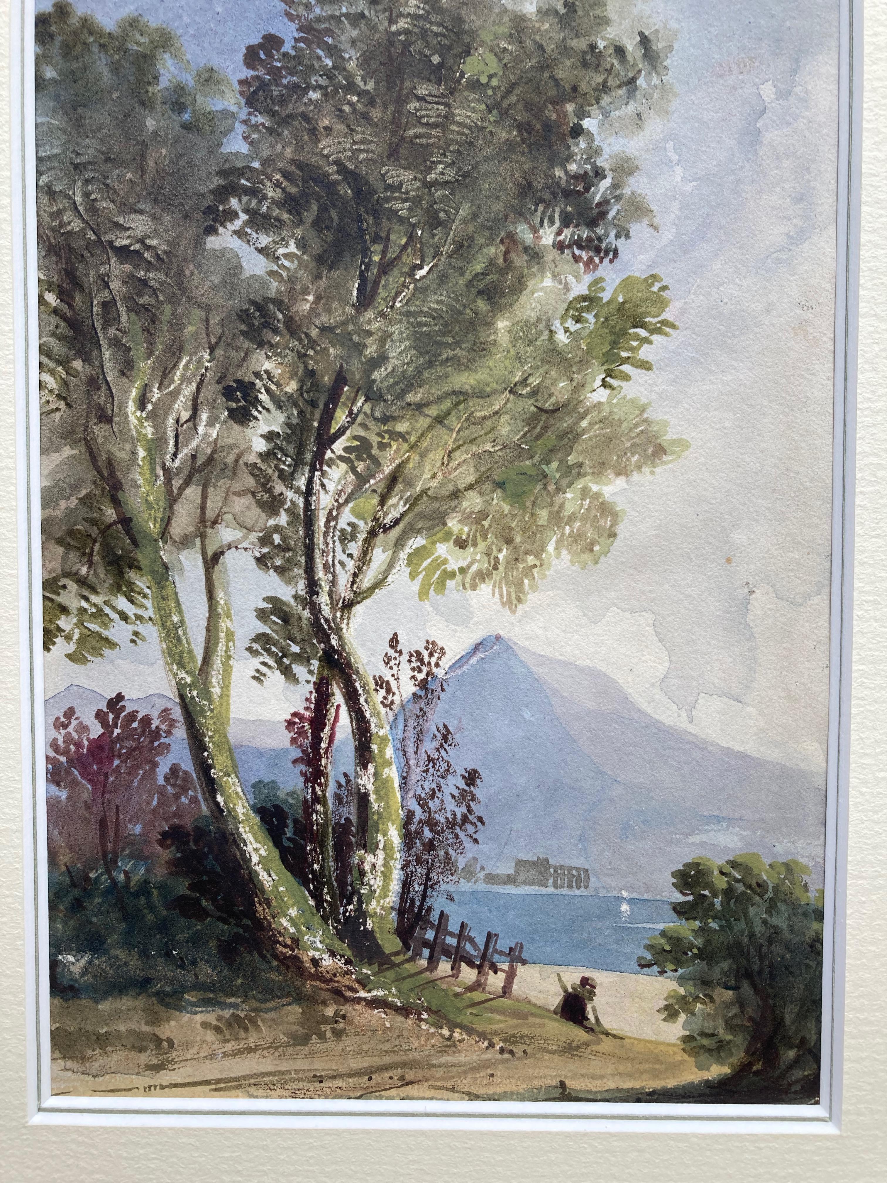 A charming 19th century view of a figure on the shore of a mountain lake, framed by the foliage of a birch tree.

Circle of John Varley (1778-1842)
Figure on the shore of a mountain lake
Watercolour with scratching out.
7 x 4¾ inches
13½ x 10¾