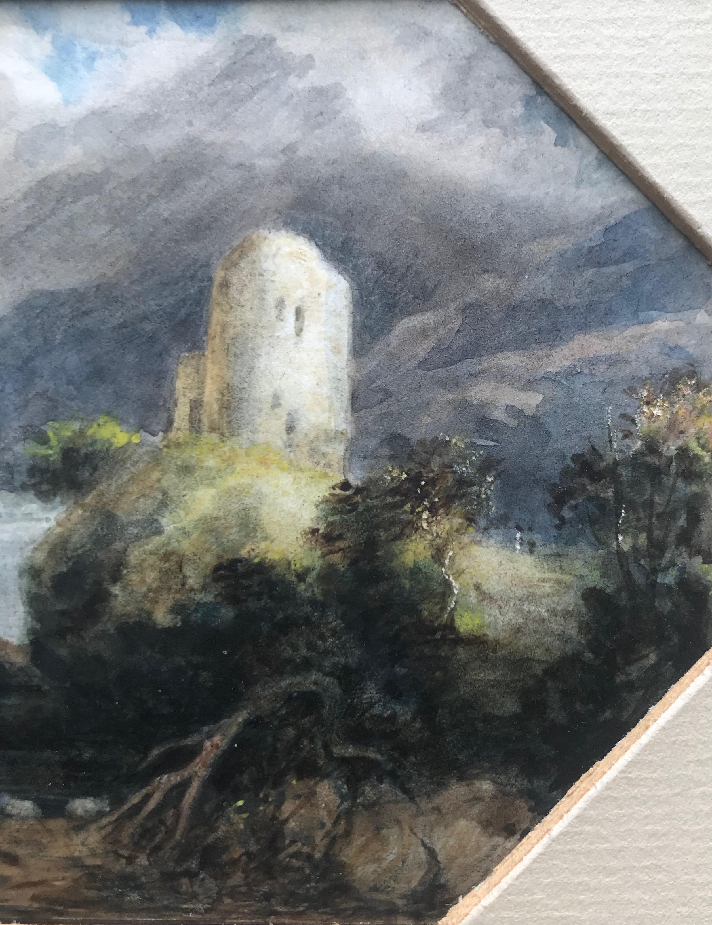 Follow of Joseph Mallord William Turner, mid 19th Century
The castle by the loch
Watercolour
Hexagonal  3 x 3¾ inches
6¾ x 9½ with frame

A very atmospheric view of a romantically set castle on the banks of a loch. The artist has captured a storm