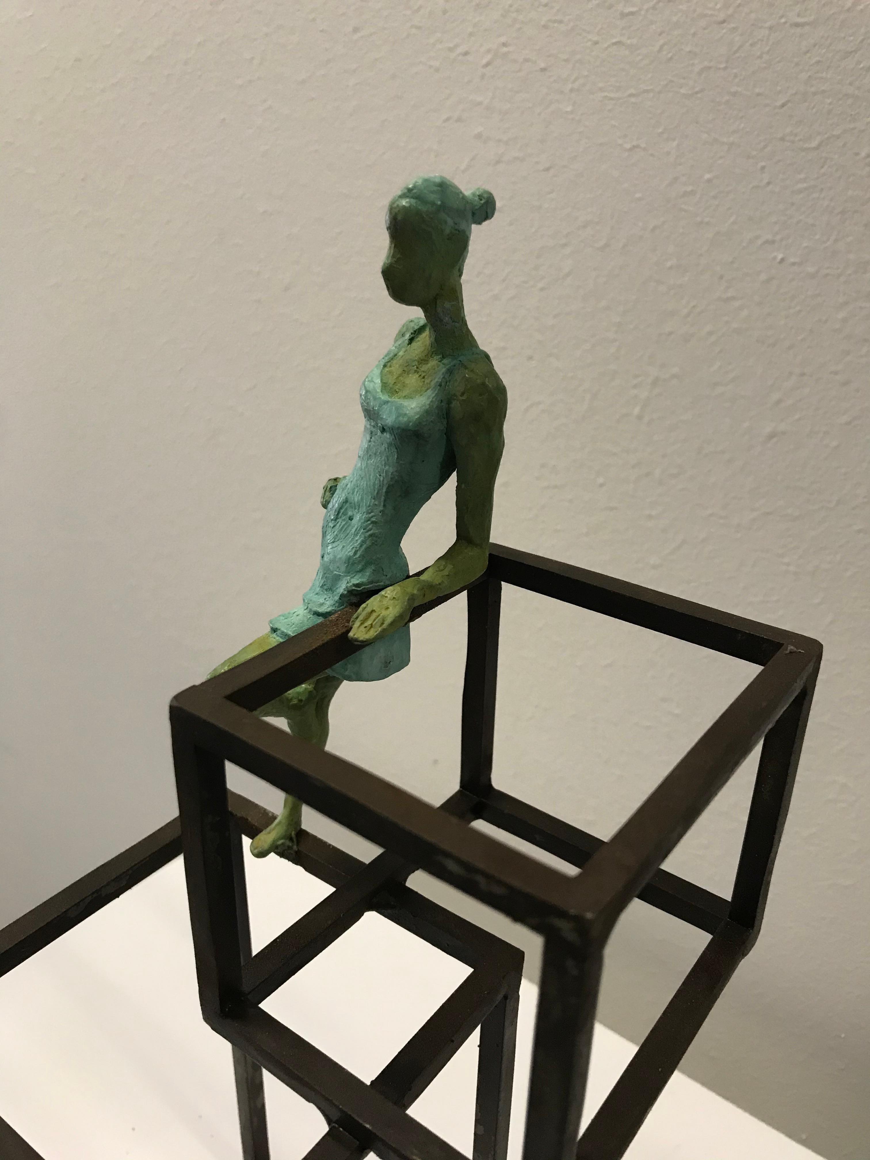 Cuba Cube III is a bronze sculpture with green patina, it is connected to a steel base. The edition size is 50. This sculpture stands on shelf as well as be hung on wall.  This sculpture is part of the Cuba Series of Joan Artigas which is inspired