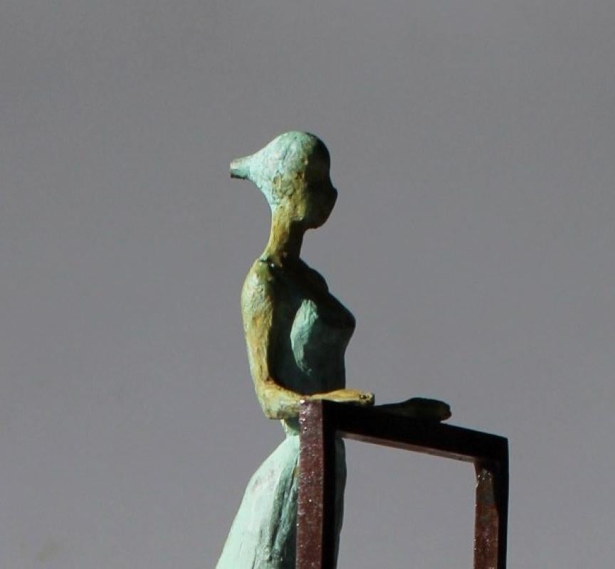 Viewpoint is a bronze sculpture with green patina, it is connected to a steel base. The edition size is 50. This sculpture stands on shelf as well as be hung on wall.  

Joan’s latest sculpture series of female figures brings an out-of-the-box