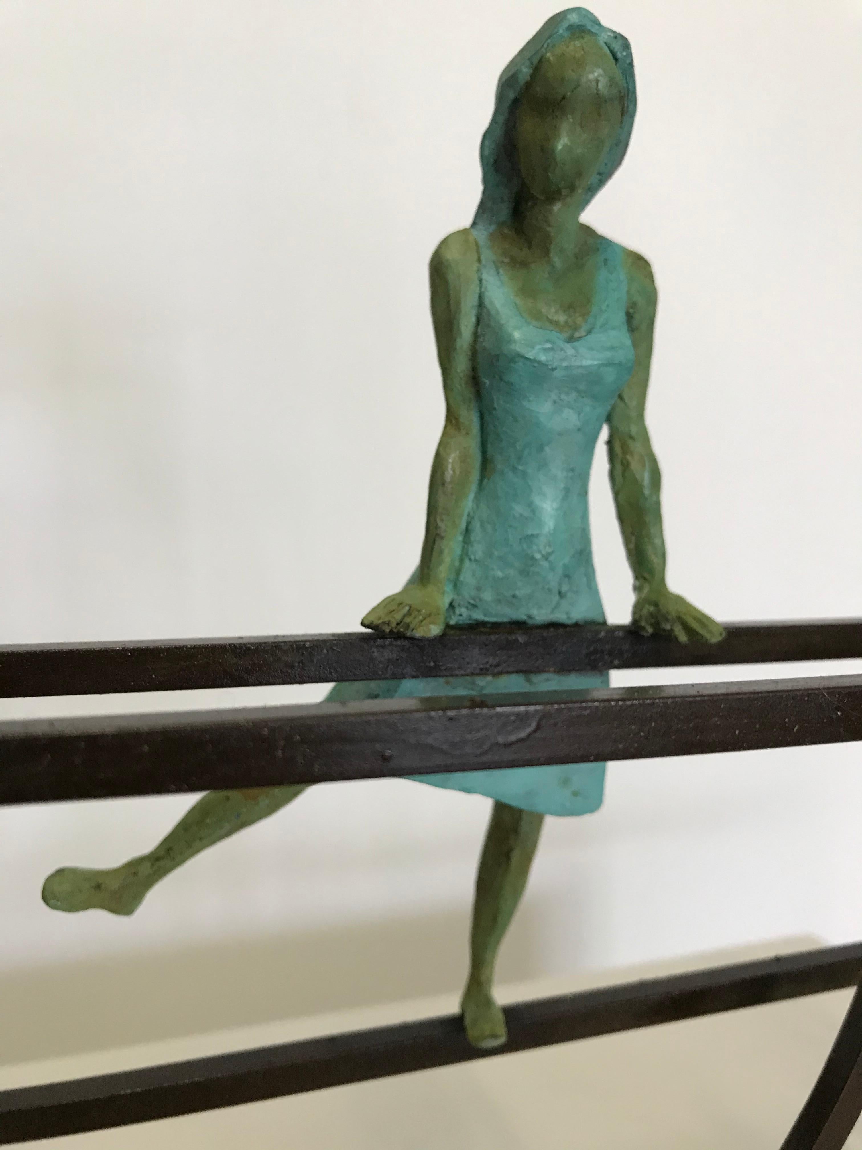 Rosette is a bronze sculpture with green patina, it is connected to a steel base. The edition size is 50. This sculpture stands on shelf as well as be hung on wall.  

Joan’s latest sculpture series of female figures brings an out-of-the-box