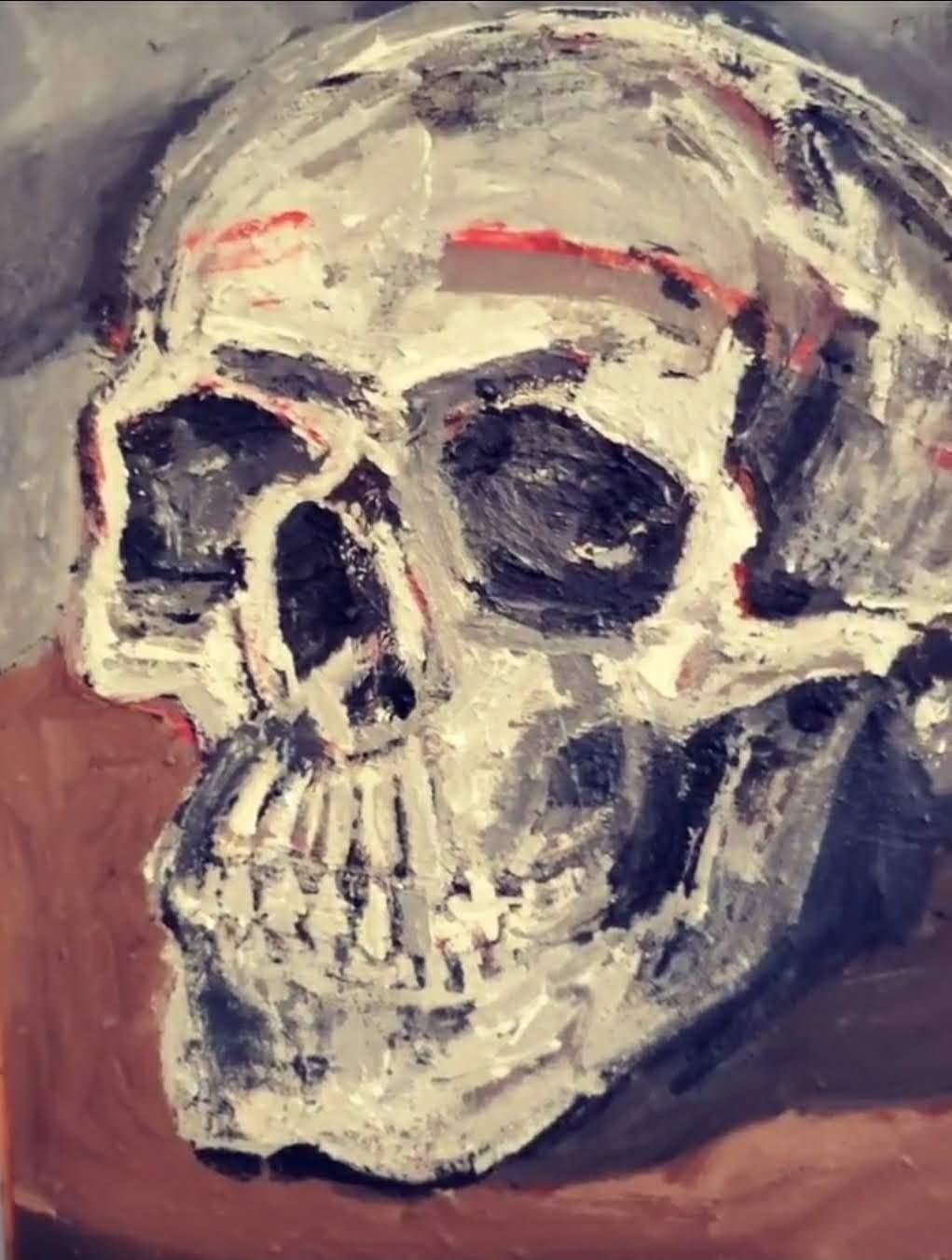 skull on table painting