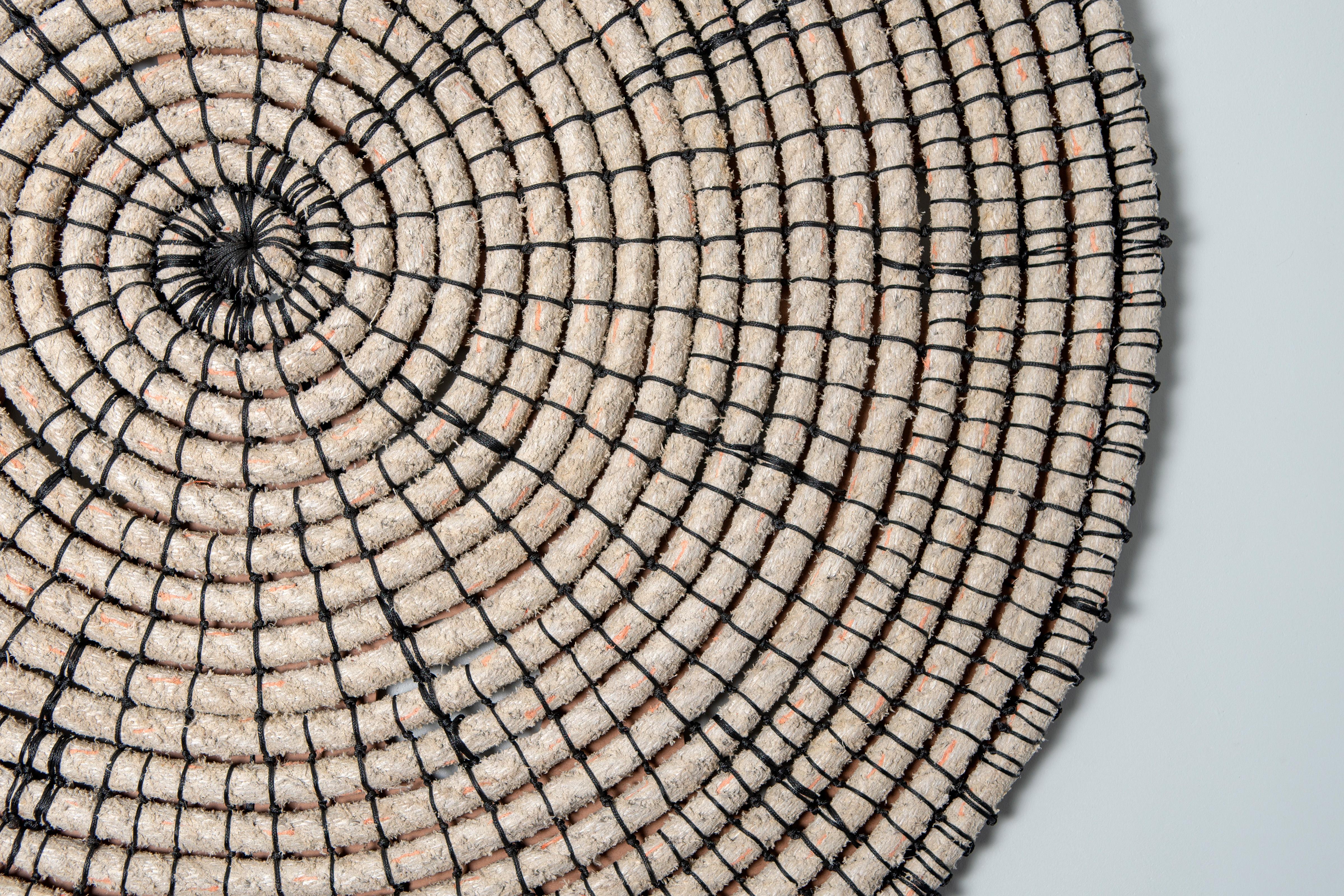 Baskets reimagined 1, Laimi Mbangula, rope, acrylic string, wooden base 1