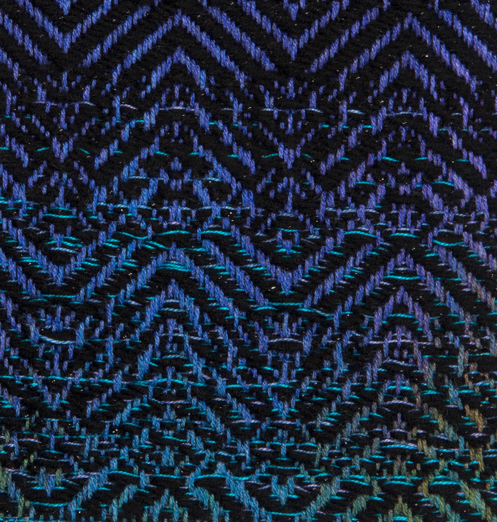 Ronel: Strength, 2015. Worsted Merino with Acrylic Yarn hand dyed, woven on Digital Dobby Loom.

Born in Namibia, Lynette Diergaardt received her Bachelors of Art from the University of Namibia and her Masters in Textiles as a Fulbright Scholar at