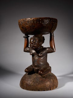 Massive and Robust Zela Caryatide Stool held by a Female sculpture