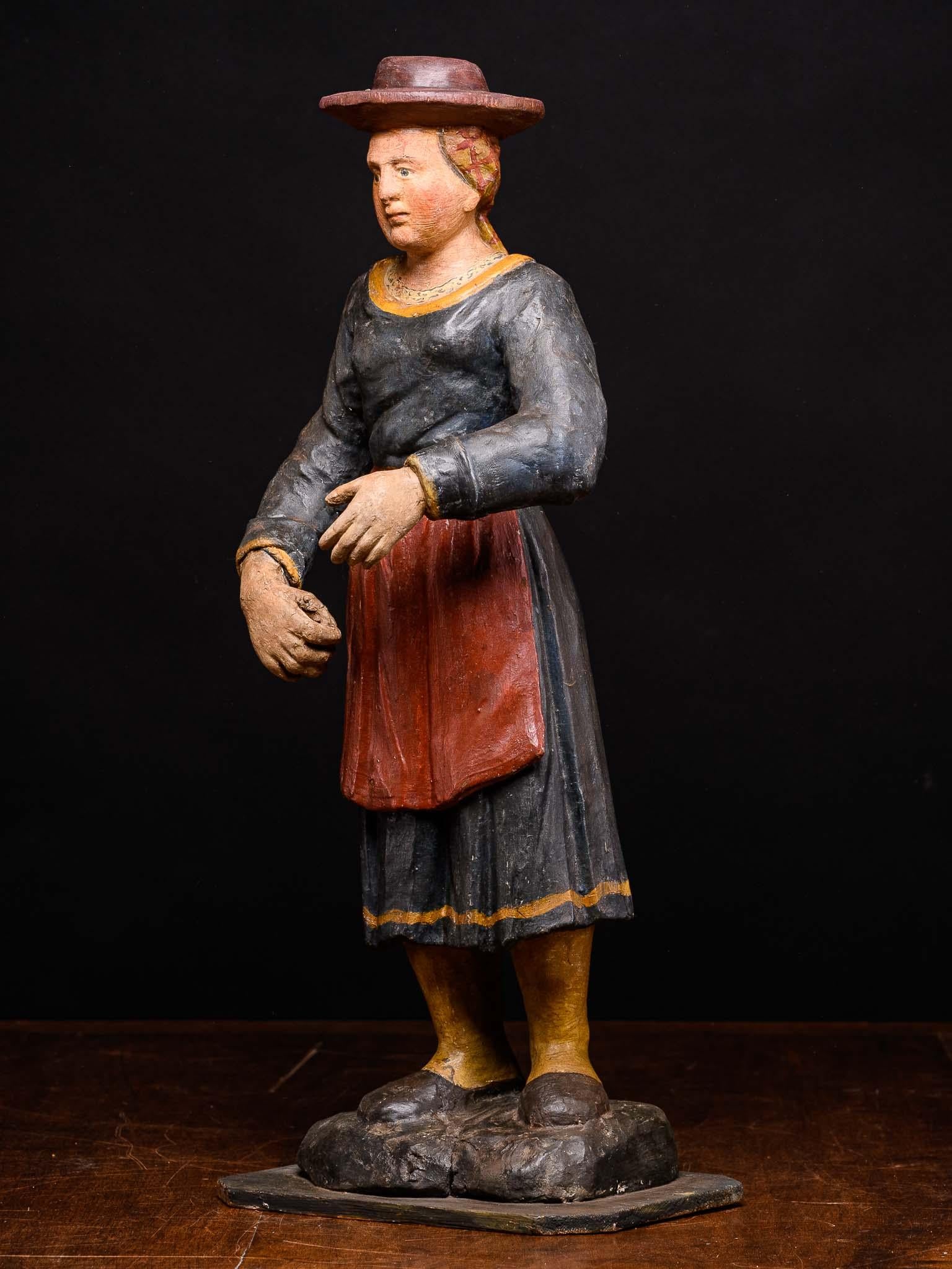 19. Jh. Zwei bretonische Statuen aus polychromem Obstholz, die einen Fischer und seine Frau darstellen, Herkunft Frankreich.