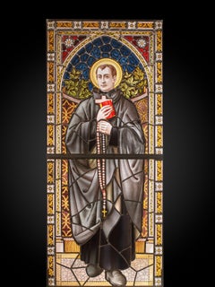 Neo-Gothic Stained Glass Window with St. John Berchmans.