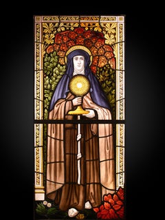 Neo-Gothic Stained Glass Window with Saint Clare of Assisi.
