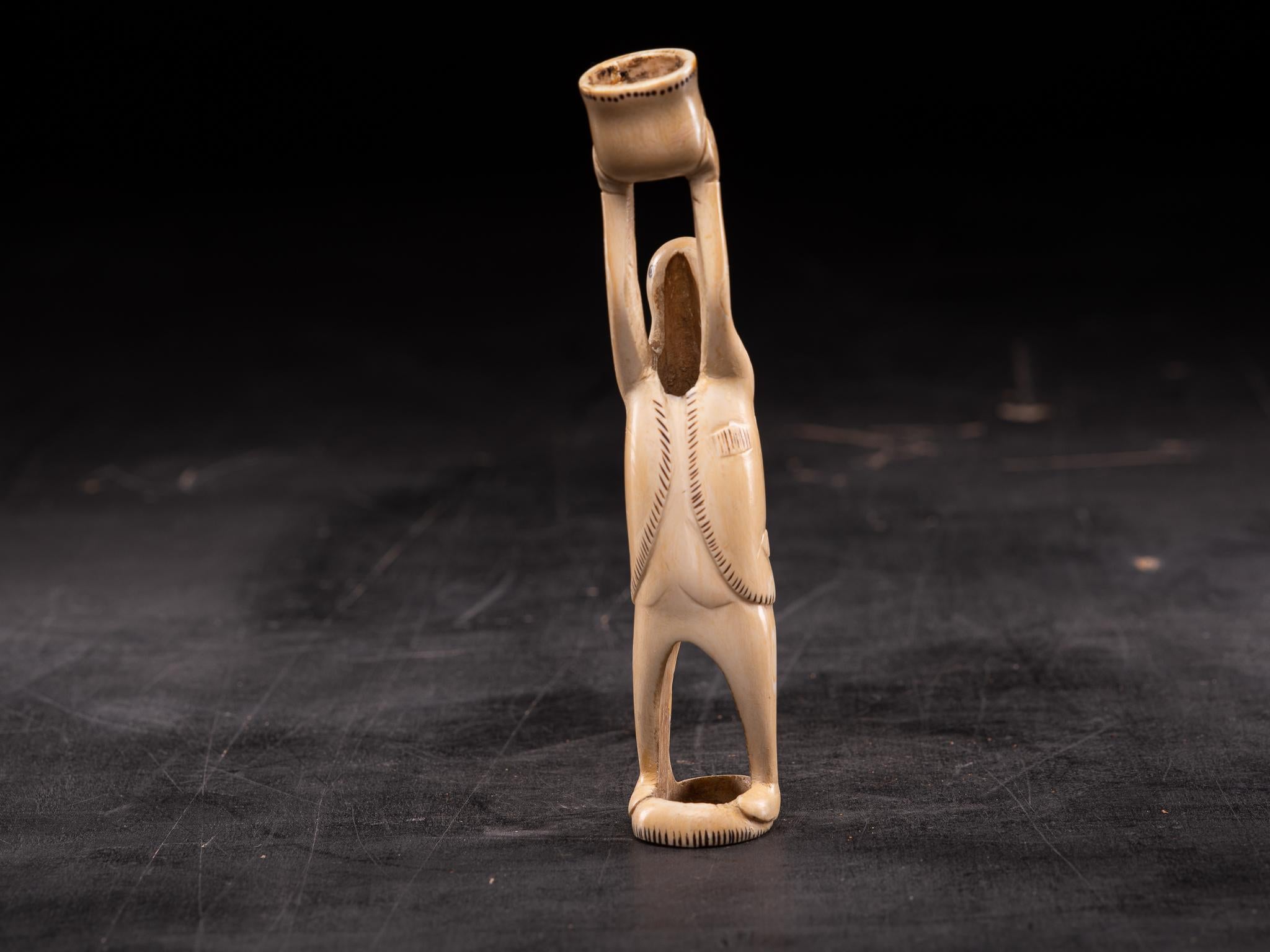 This pair is a fine example of ivory carving done by Inuit natives; Native Americans who live within and just below the Arctic Circle. Each year they procured a substantial amount of ivory from their walrus kills. The raw ivory was usually thrown on