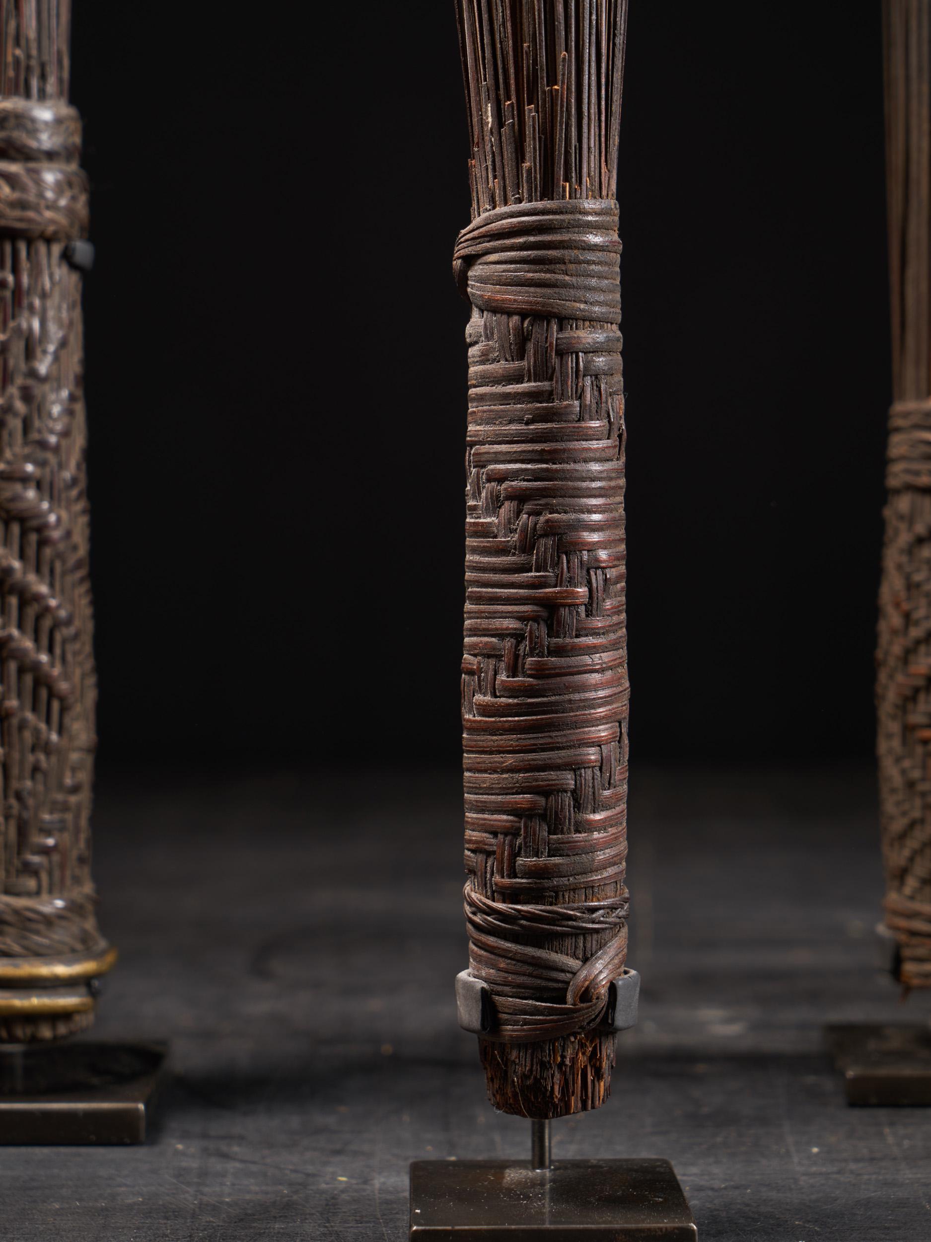 The Sceptres are made of the Midrib of Palm tree leaves. They were used by the Lilwaa Secret Society of the Mbole Tribe members who live in the South-Western part of Kongo. The finishing is very minimalistic and refined.