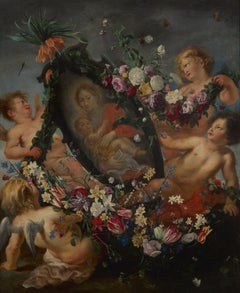 Flower guirlande containing the Holy Mother and Child, carried by four angels 