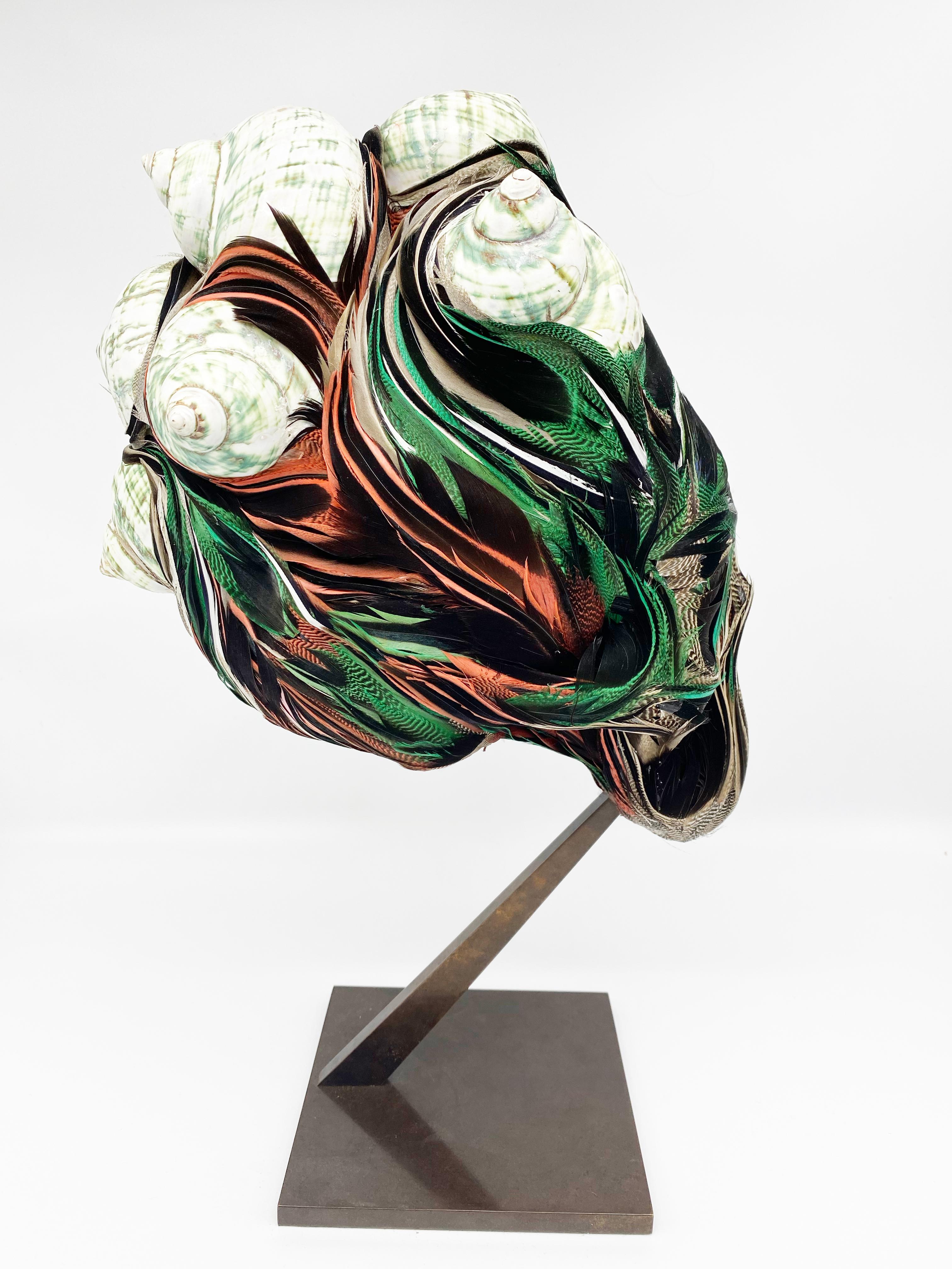 Kiko, Skull, Recycled feathers and Nocibe shells on resin, base in brass - Sculpture by Laurence Le Constant