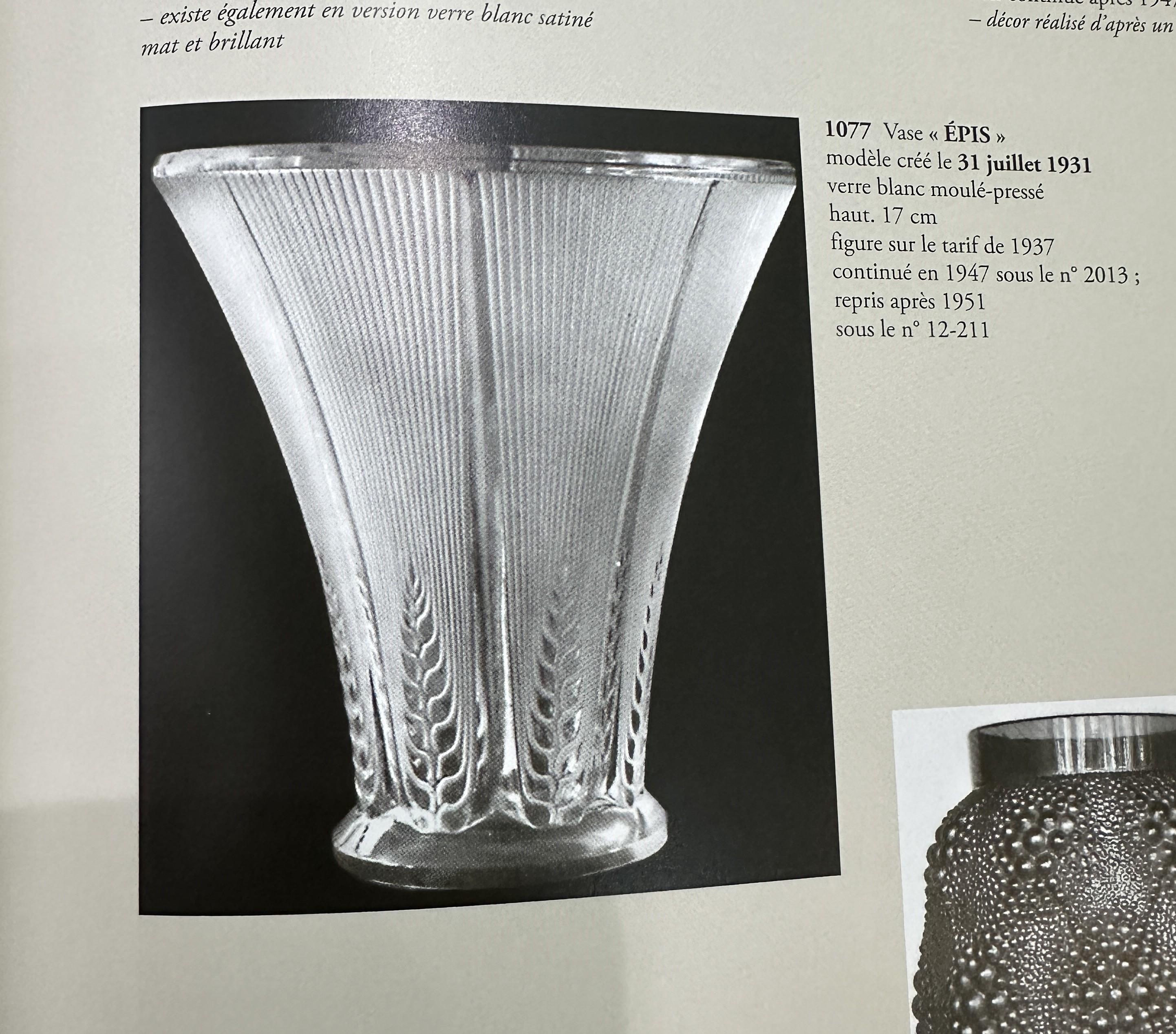 Rene Lalique
Vaso Epis, 1931 
7 x 6.5 in 
vetro bianco pressato e modellato 
cod1077