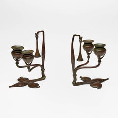 Tiffany Studios, Fleur-de-lis candleholders with snuffers, set of two