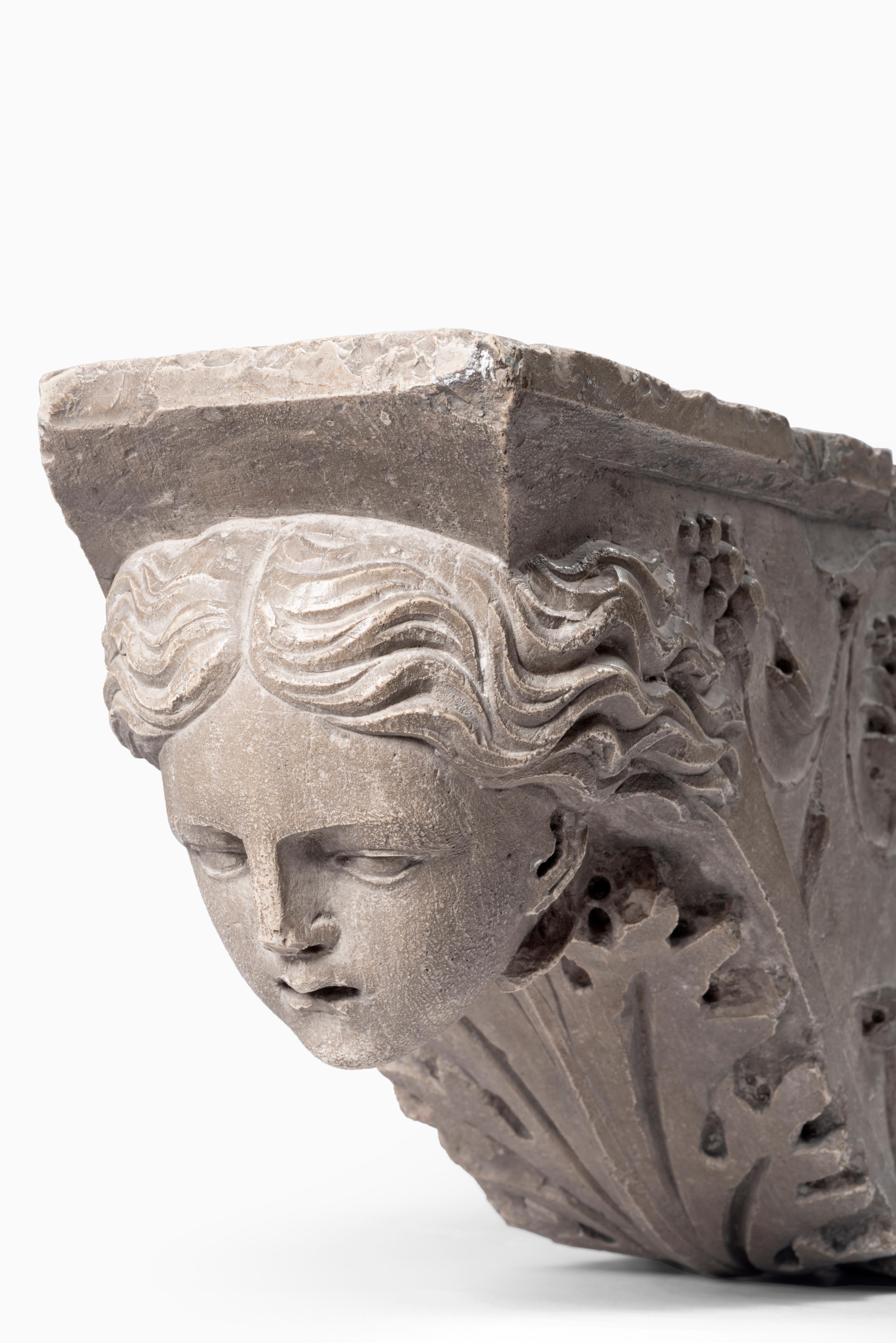 Richly decorated on the side and with finely sculpted female faces, these carved stone architectural brackets are a great example of the Tuscan production of the late 16th Century. Overall in good condition, Italian works of this type are quite rare