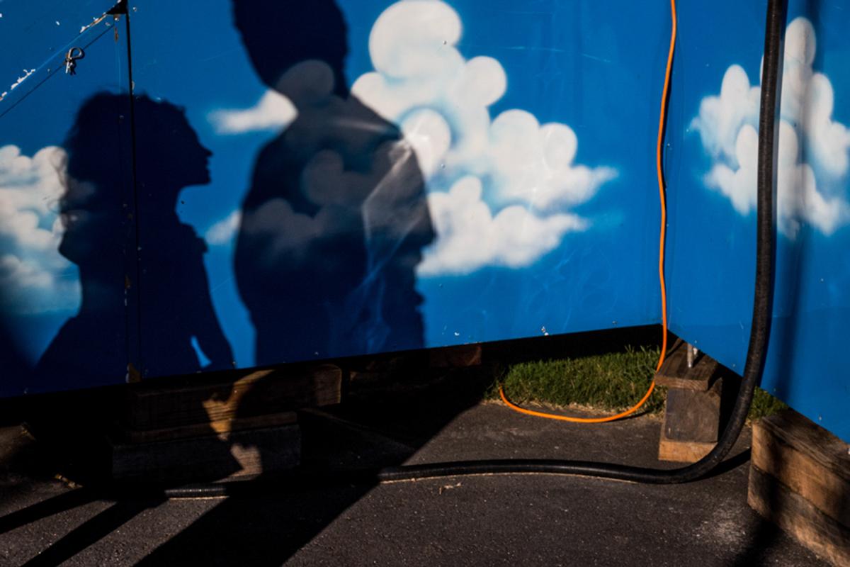 Mark Cáceres Color Photograph - "Clouds & Electrical Cord, North Georgia State Fair" - Carnival Photography