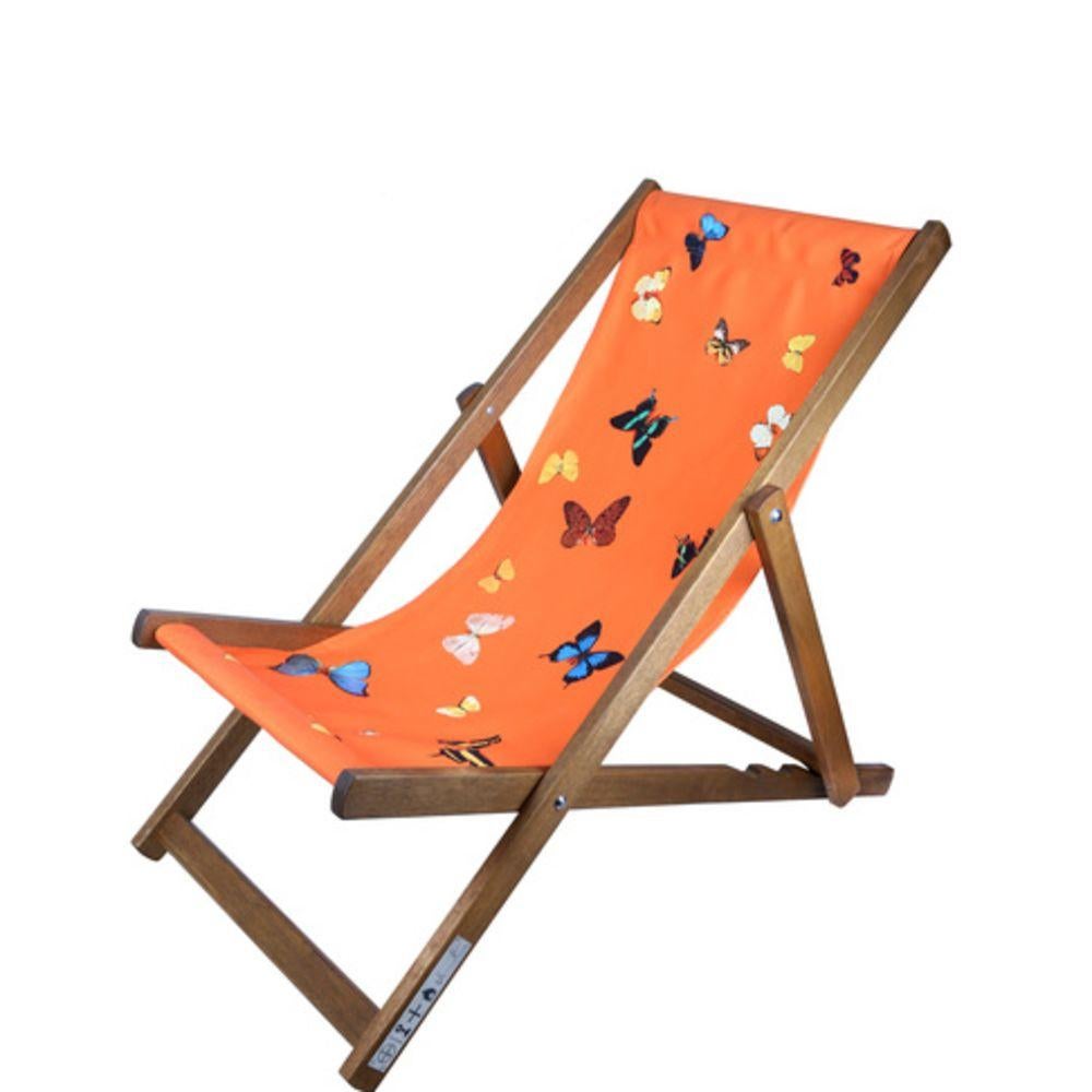 Hirst's Deckchairs use one of the artist's familiar motifs: a monochromatic background interrupted by a scattering of butterflies freezed in an eternal position. 

Damien Hirst
Deckchair (Orange) - Contemporary art, 21st Century, Orange, Design,