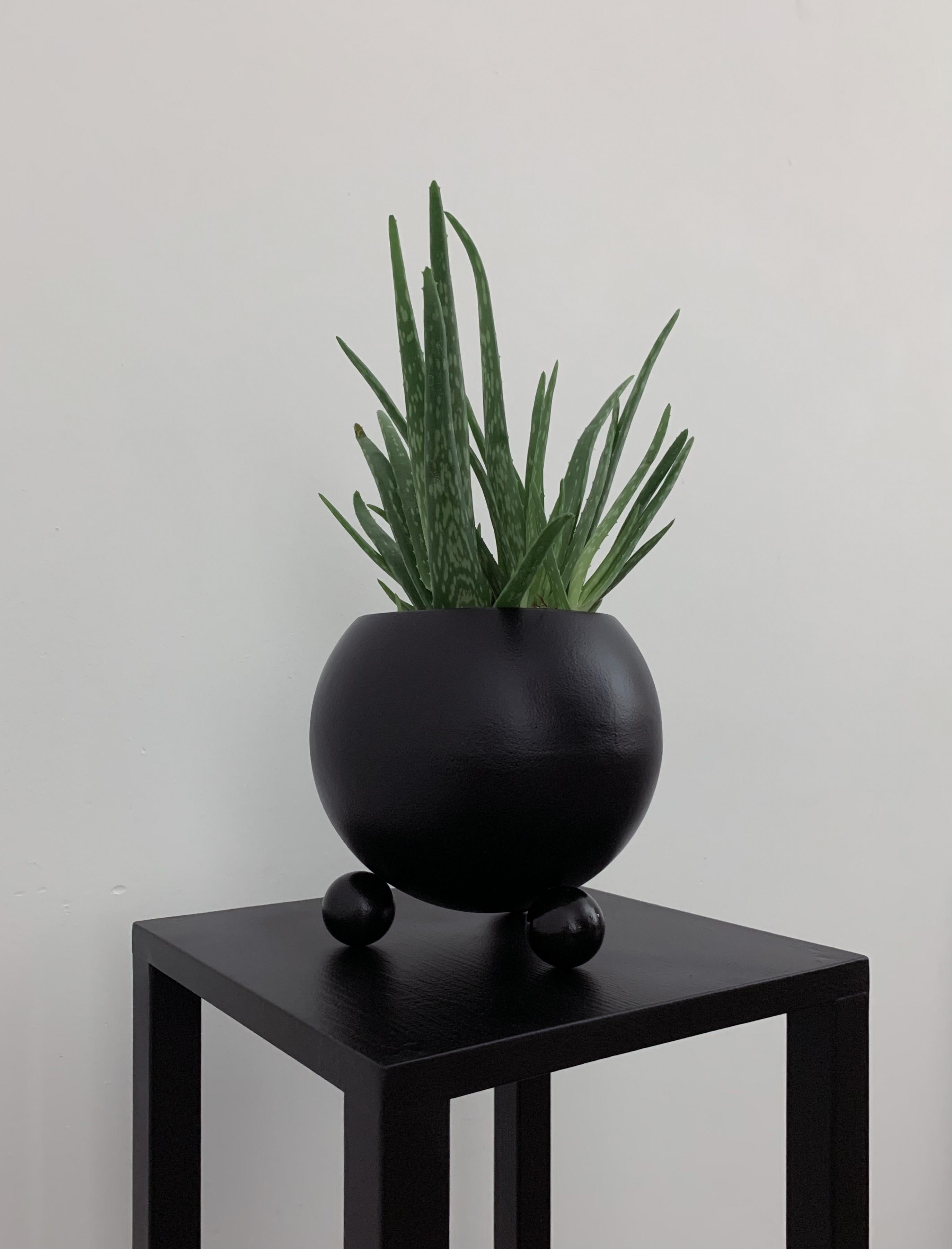Arty decorative hand-made plant pot, black with black glossy legs 2