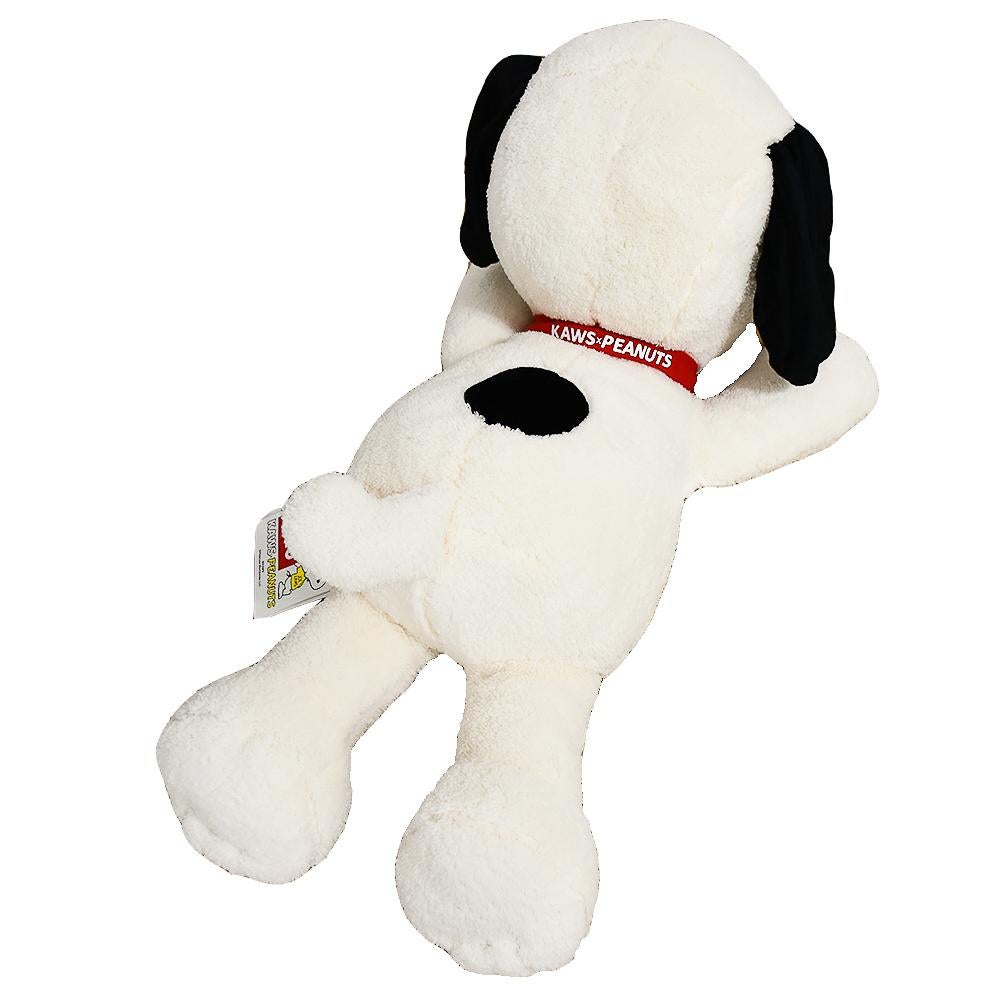 Super soft Kaws X Peanuts collaboration Plush.
Re-imagined by Kaws complete with the recognizable Kaws X eyes.
Made and released by Uniqlo in 2017.
Has red band collar around Snoopy neck the reads “KAWS X PEANUTS”.
100% Polyester outer shell and