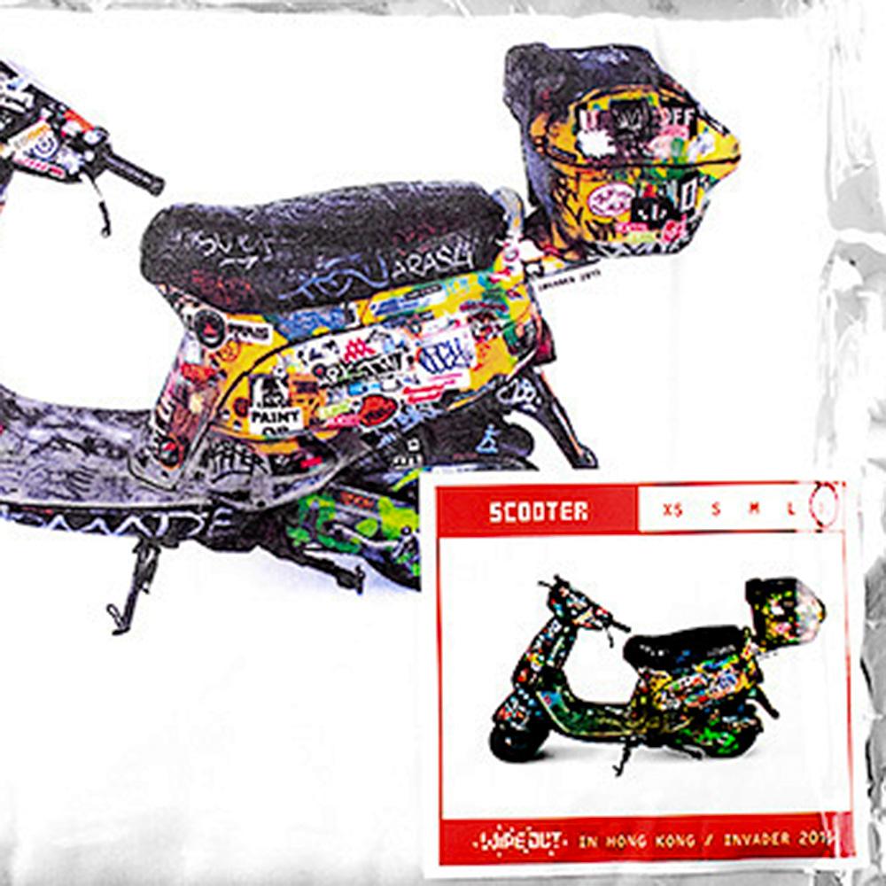 A very limited number of Invader t-shirts were released for each size in 2015 for his Wipe Out exhibition in Hong Kong. 
This is a rare XL.
Scooter in image was used by Invader from 1999-2005. It has been covered in tags and stickers from all the