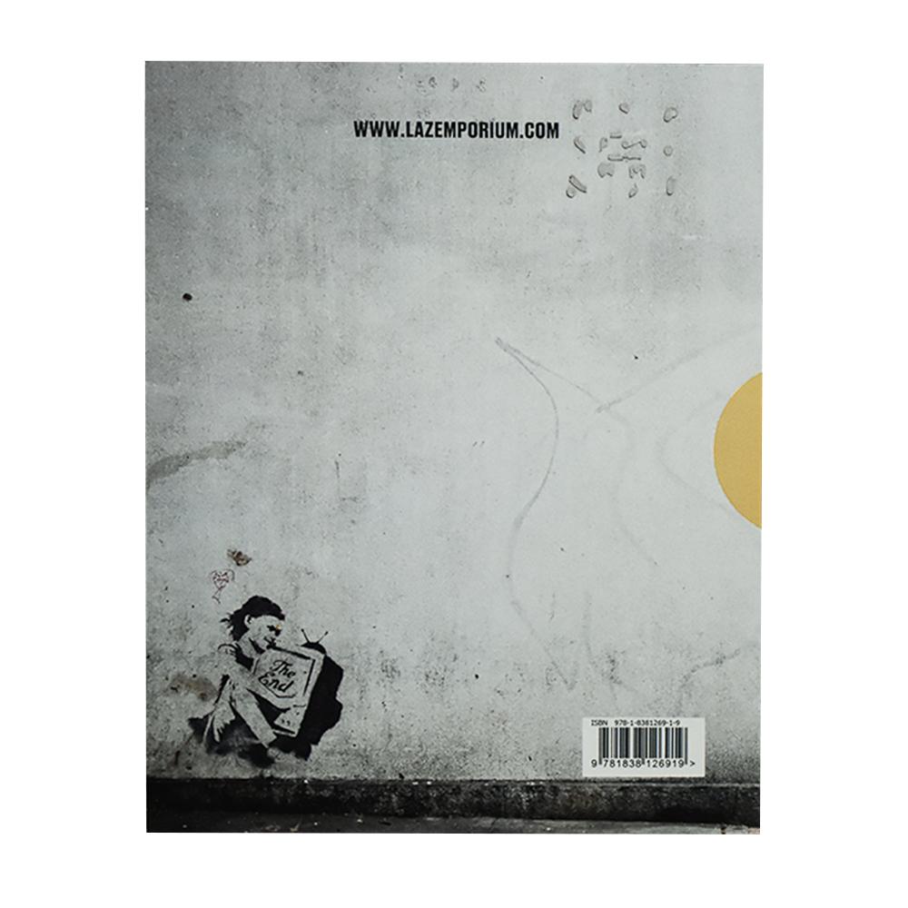 Volume 2 of Banksy Captured by Banksy’s ex-manager Steve Lazarides.
Features images from his show in Los Angeles, Crude Oils and many other locations.
Has many never before seen images of Banksy (face covered) and artworks from the late 90’s and