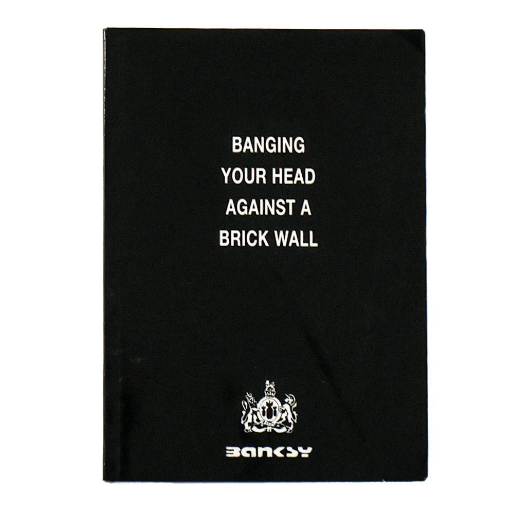 Banging Your Head Against a Brick Wall (Mini Book) - Street Art Art by Banksy