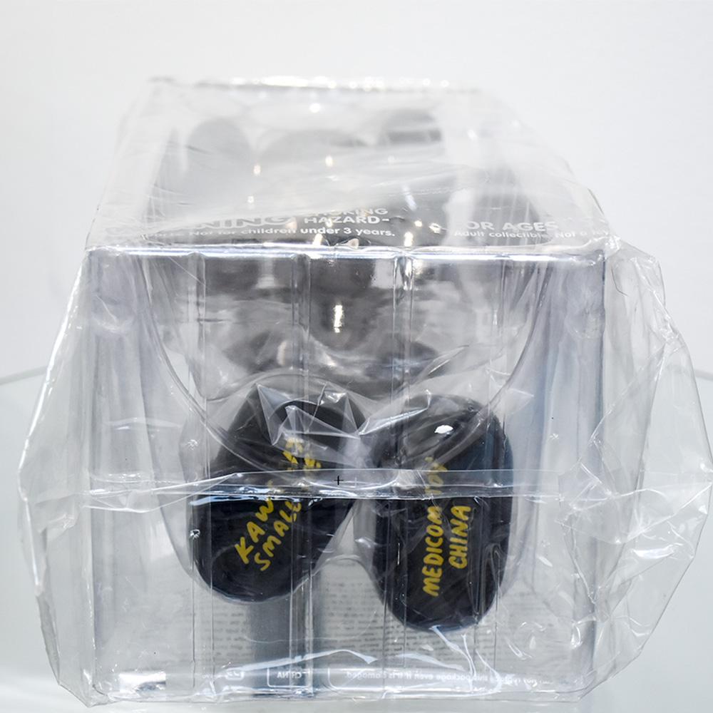 Kaws Small Lie Figure based on the Pinocchio character.
Kaws debuted this character as a giant 30 foot wood sculpture at the Yorkshire Sculpture Park in UK. 
This art toy or sculpture was released in 2017.
Black Edition of Small Lie