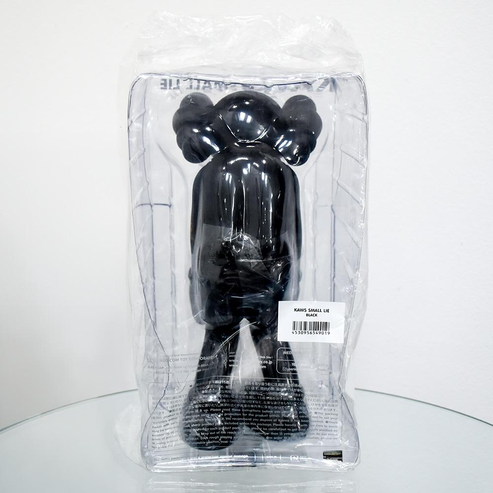 Small Lie (Black) - Contemporary Art by KAWS