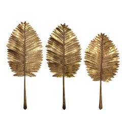 Grupo de tres esculturas vintage de metal en forma de hoja de palmera