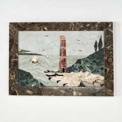 Antico quadro italiano in pietra intarsiata o in pietra dura raffigurante un paesaggio costiero con faro