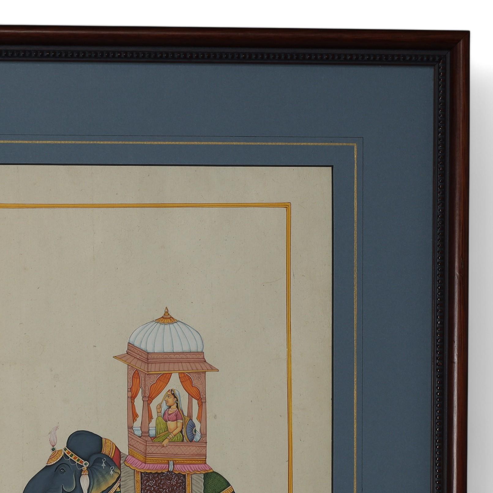 Superbe paire d'aquarelles anglo-indiennes sur papier représentant un homme et une femme chevauchant des éléphants dans des selles fantaisistes ou des howdahs. Présenté sous verre dans un cadre en acajou.