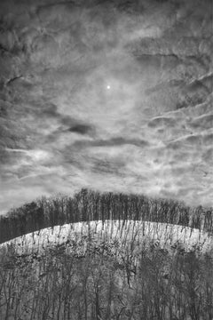 Orbit, black and white photograph of winter landscape