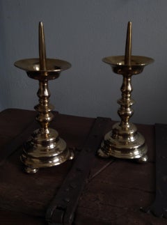 A pair of brass Baluster Pricket Candlesticks 17th Century