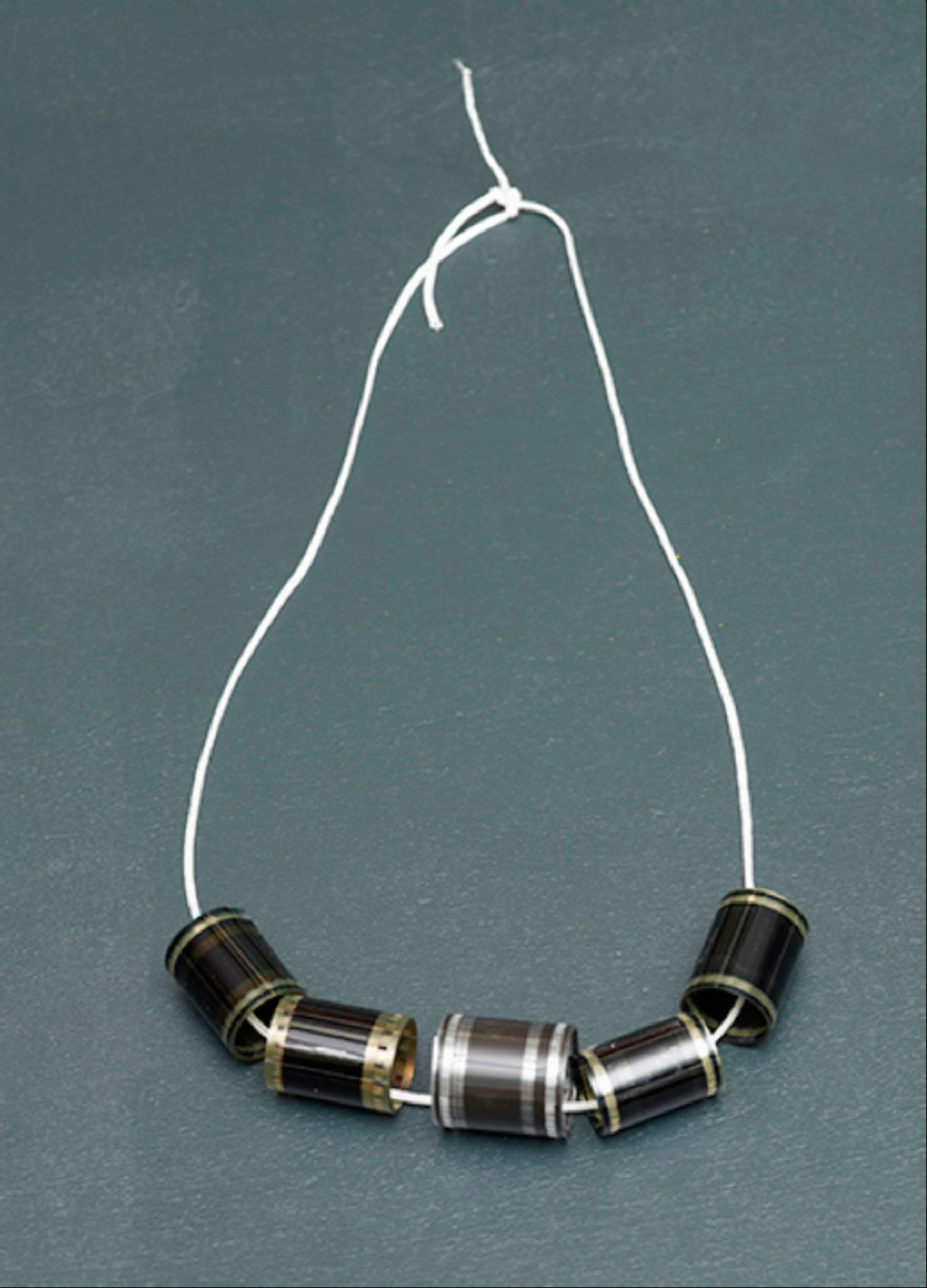 Film Reels Necklace, Limited edition of only 36, w/letter from Studio Voltaire
