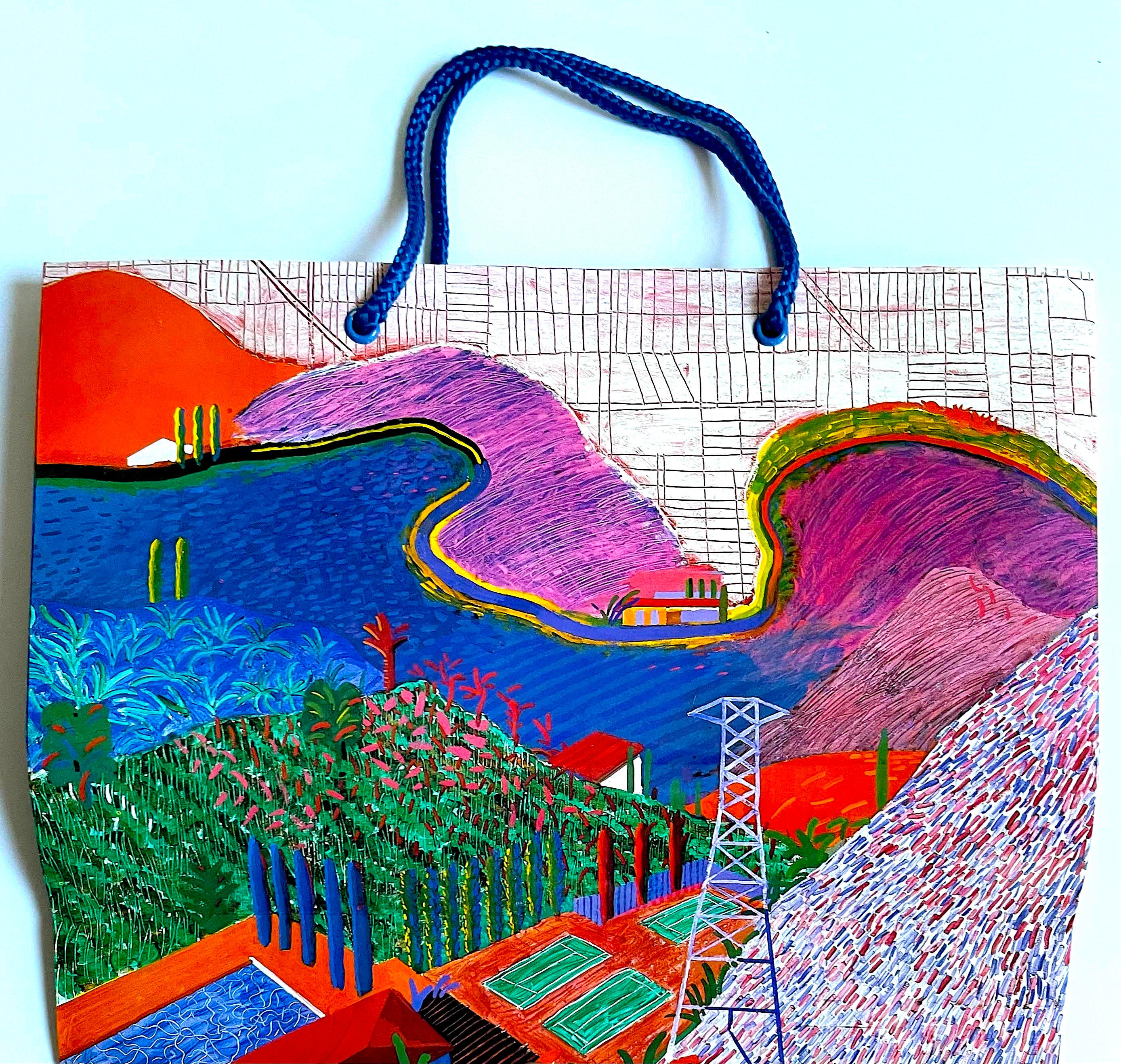 David Hockney
LA County Museum of Art (LACMA) VIP Promotional Shopping Bag, 1988
Silkscreen Paper Bag
10 1/2 × 13 1/2 inches x 2.5 inches
This uncommon David Hockney shopping bag was created, with the artist's collaboration/approval, exclusively for