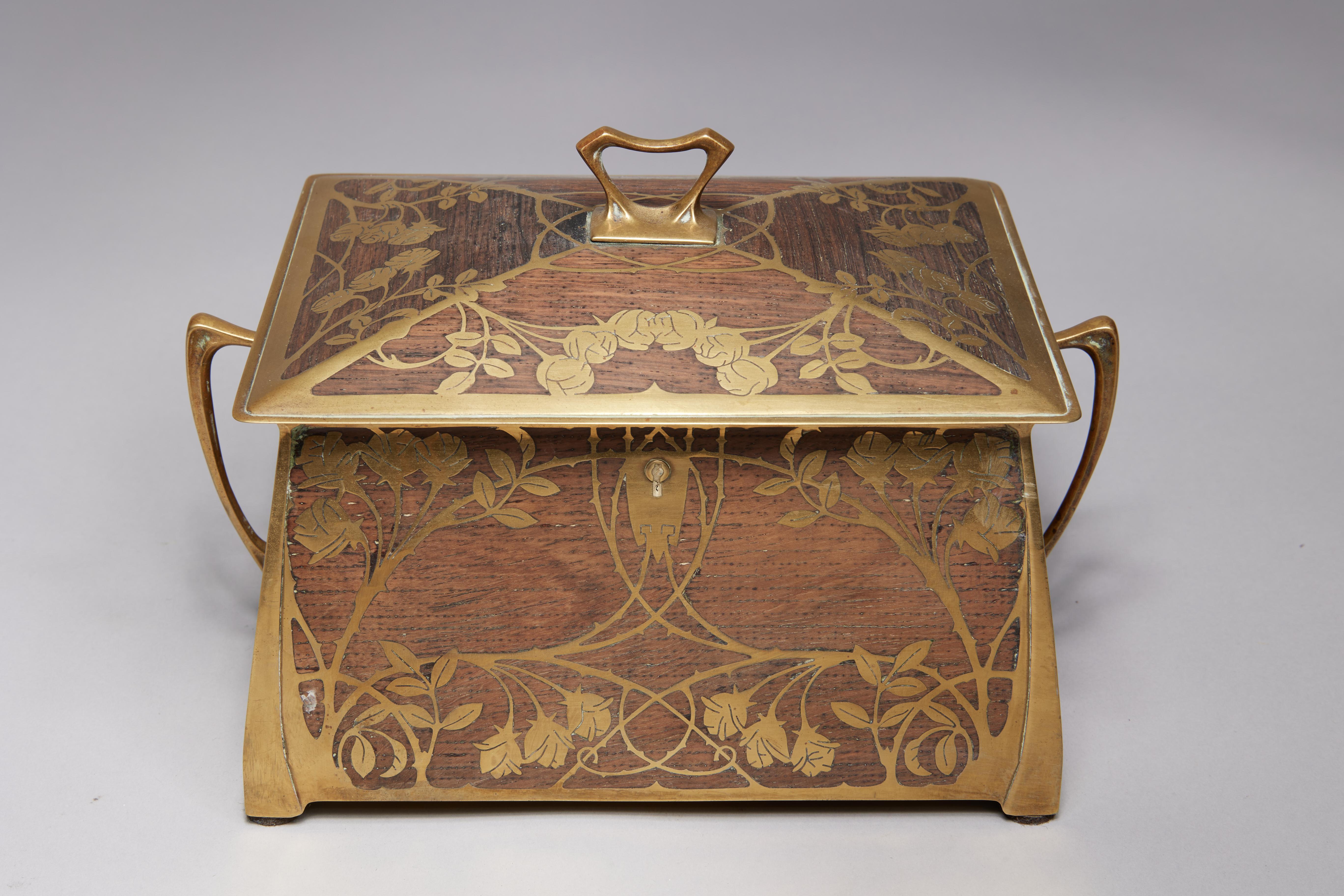 Erhard & Söhne, 19th Century
Art Nouveau Jugendstil Casque with Inlaid Brass Rose Design, c. 1904
6 x 9 x 6 inches

The company Erhard & sons was established by Carl Gottlieb Erhard and his two sons in Schwäbisch Gmünd in 1844. Carl Gottlieb Erhard,