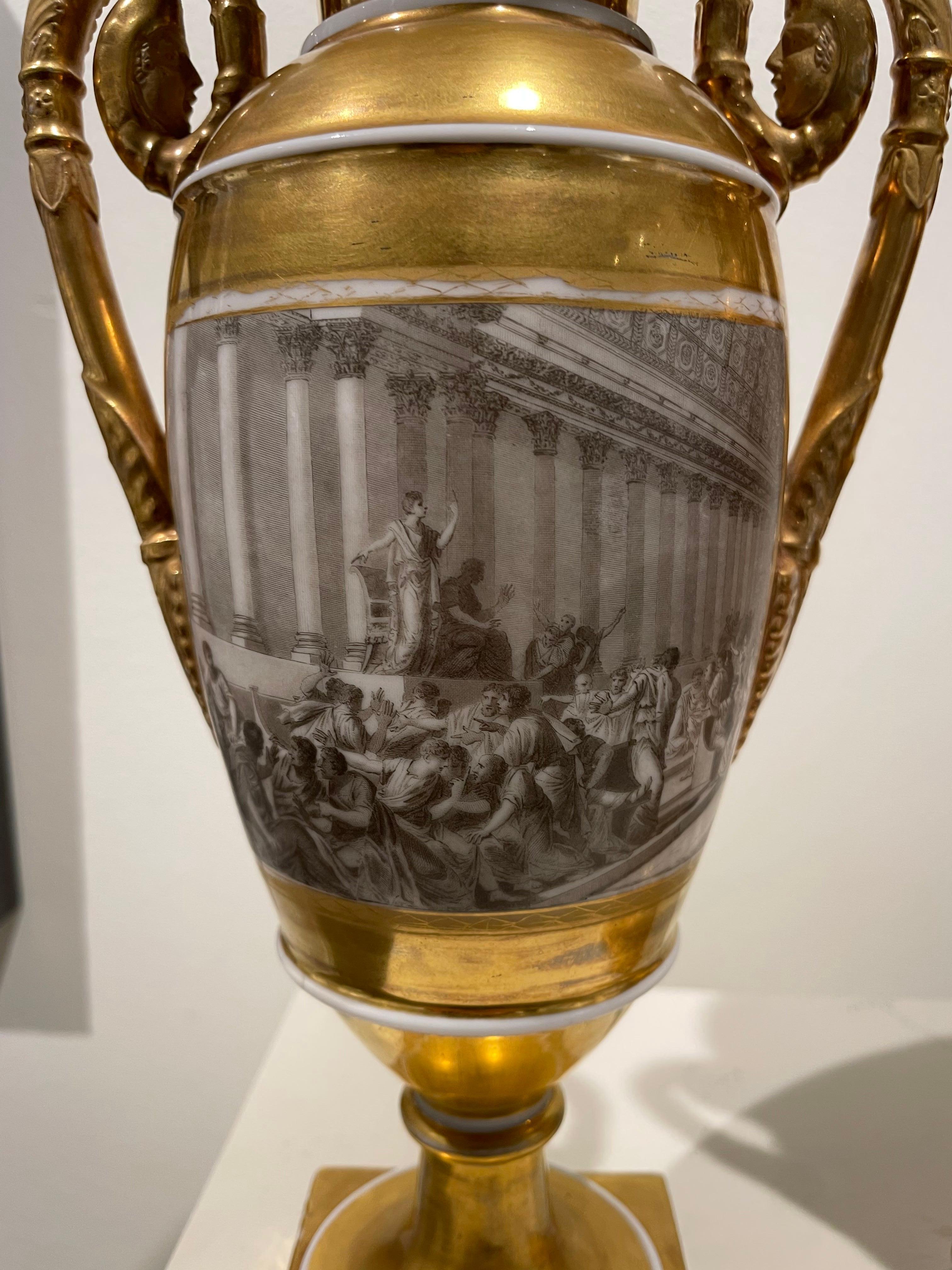 Pair of French Porcelain de Paris Gold Urns with Scenes of Roman History For Sale 12