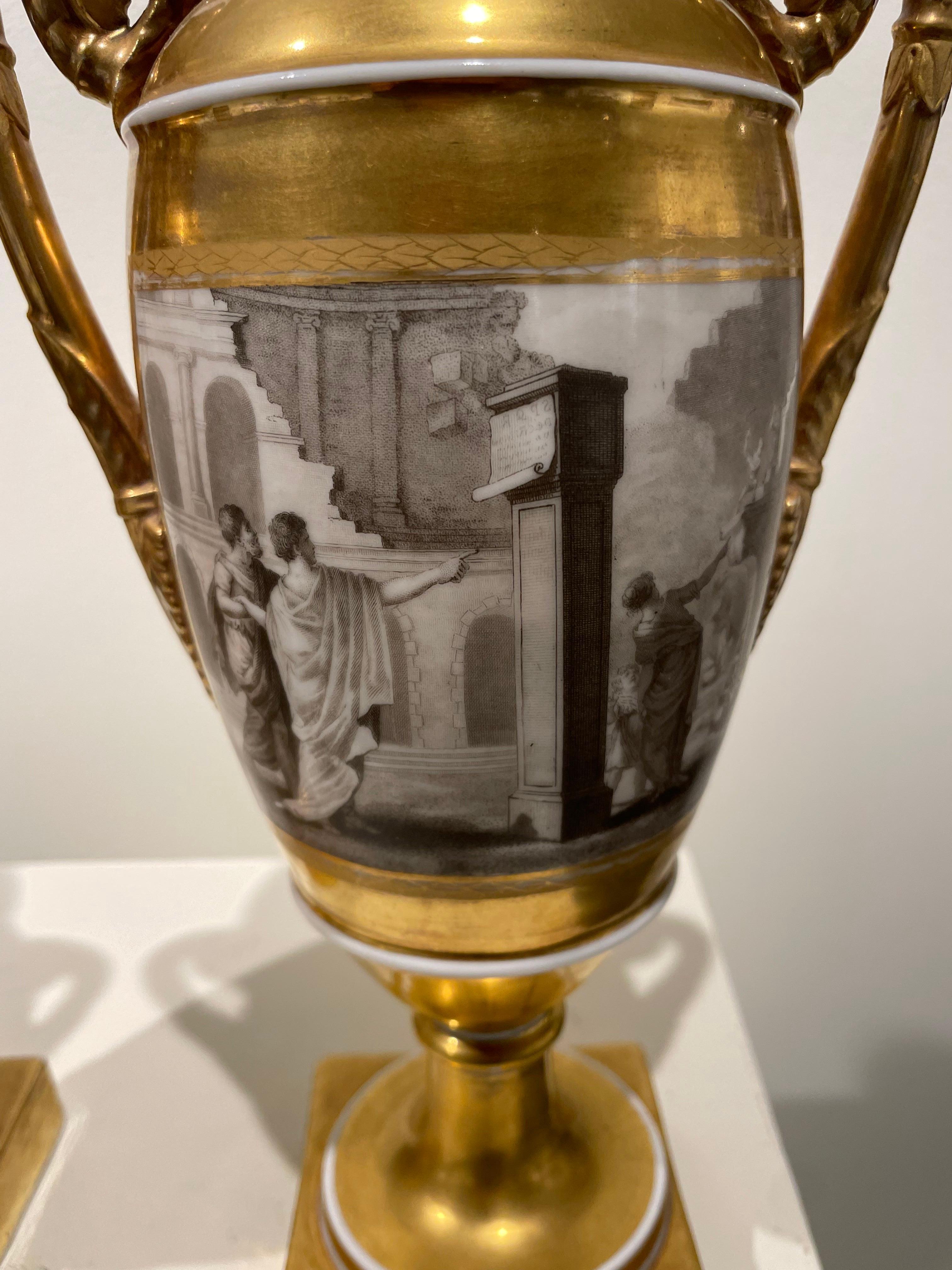 Pair of French Porcelain de Paris Gold Urns with Scenes of Roman History For Sale 13