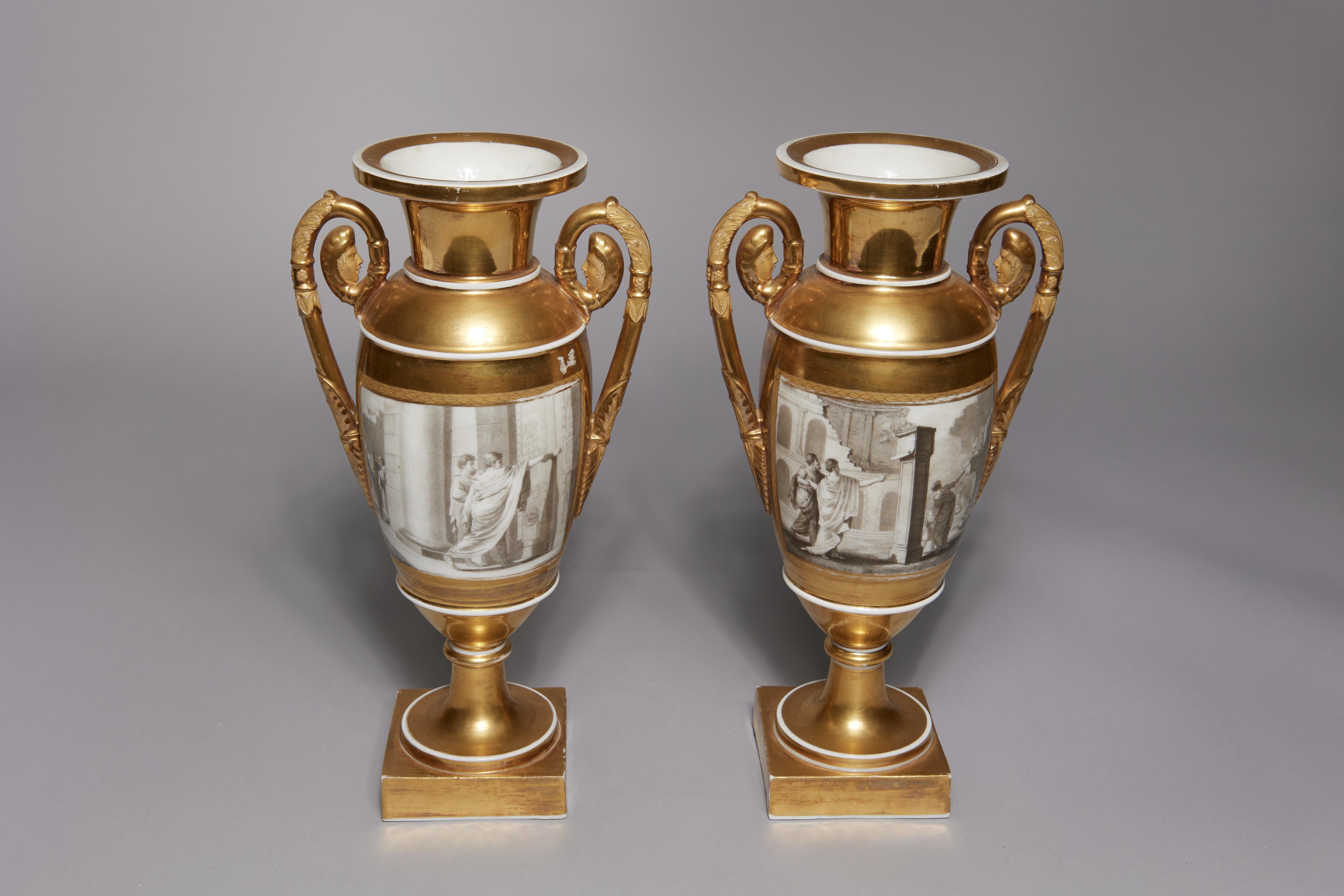 Pair of French Porcelain de Paris Gold Urns with Scenes of Roman History, Early 19th Century
13 x 6.5 x 5 inches

The base of one urn states “Tibrius Gracchus Ferme Le Temple De Saturne an de Rome 619” referring to Tiberius Sempronius Gracchus, a