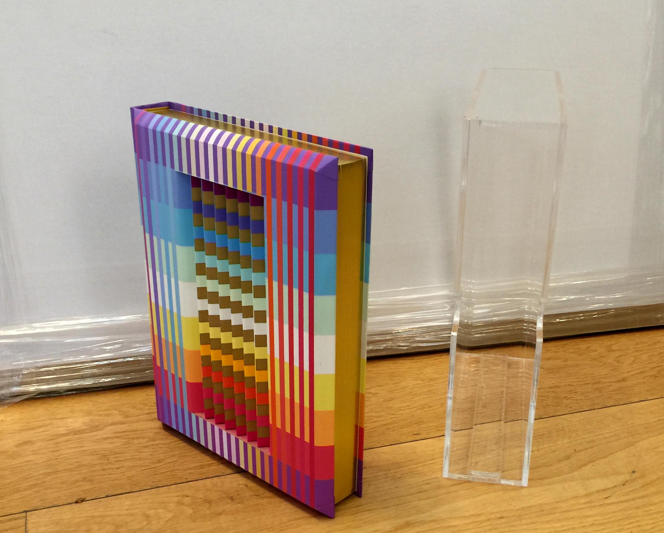 The five books of the Torah, the jewish Bible, with linear english translation.
The limited-edition cover was created in 1992 by the internationally renowned artist, Yaacov Agam.

Printed with Gefen printhouse/
It has on its front a Polymorph