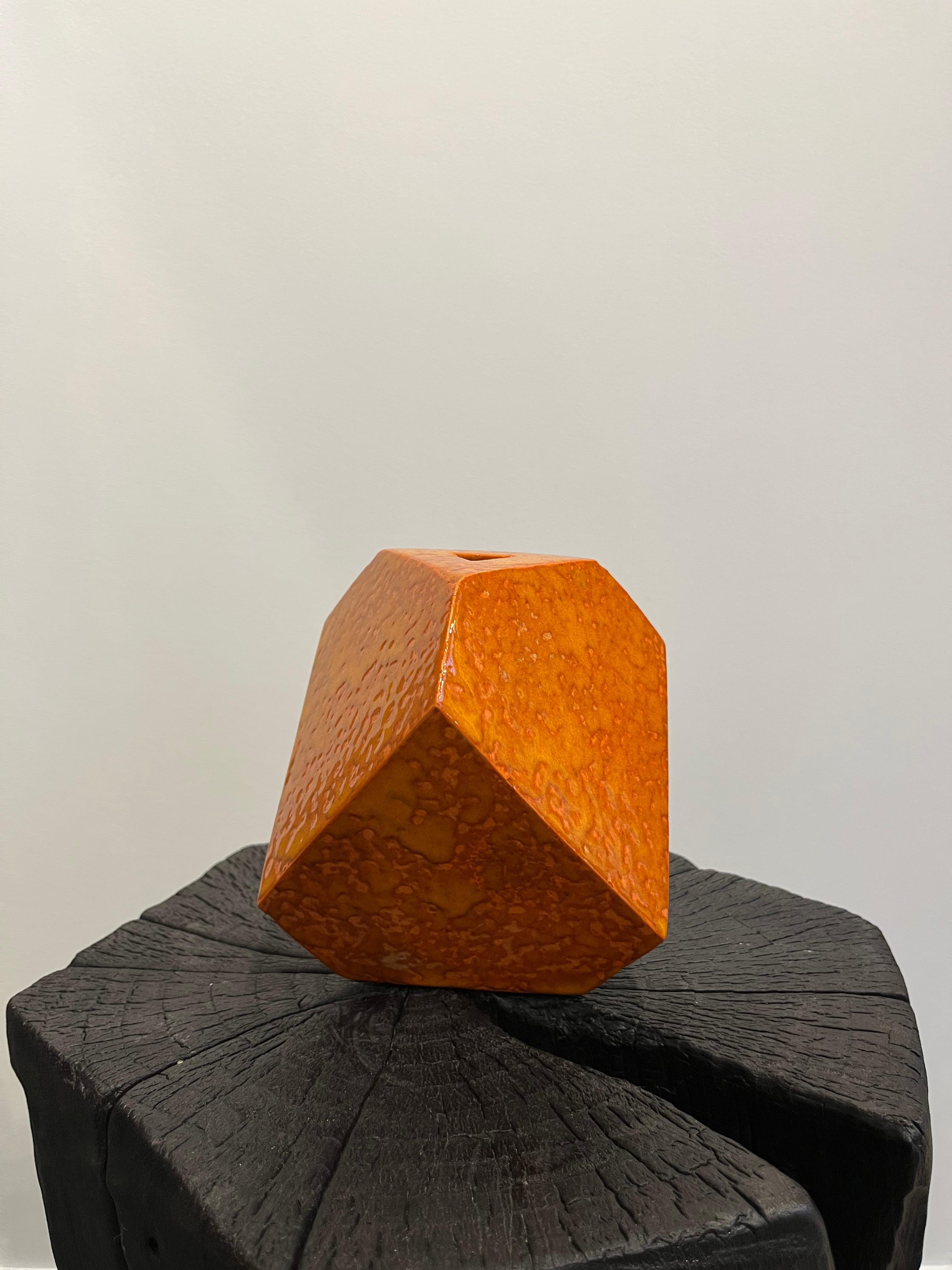 Orange rhombohedron (G)