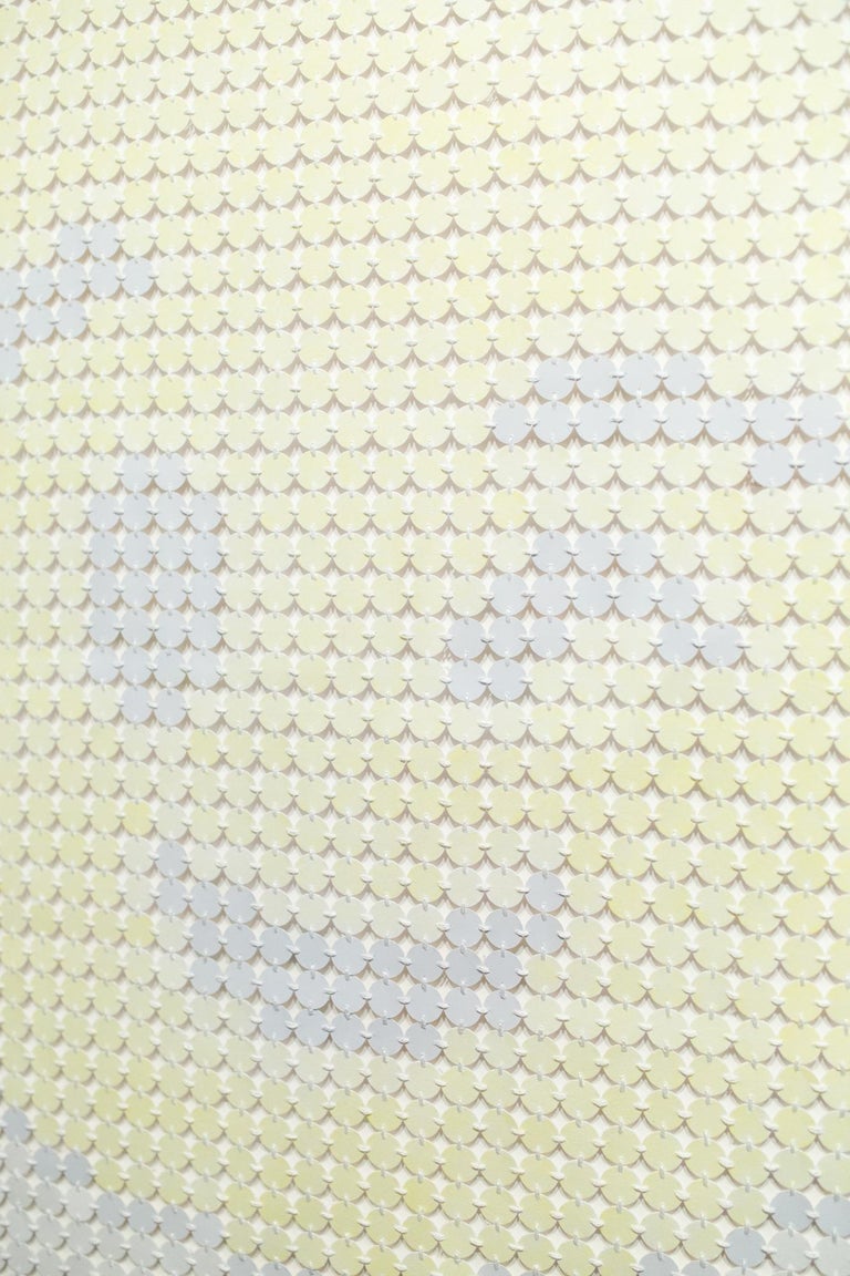 This yellow and white artwork titled 