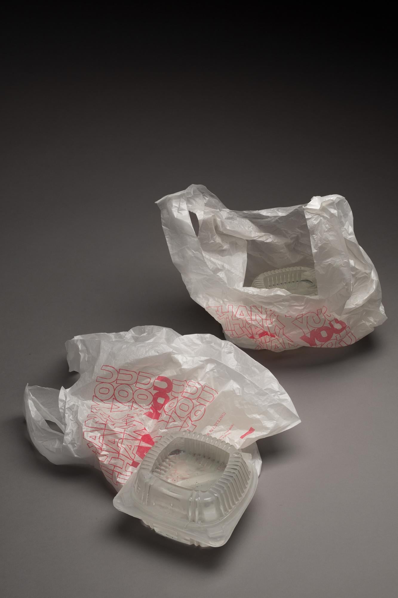 Yoonmi Nam Figurative Sculpture - "Take Out (Thank You Thank You Thank You)", Glass and Lithograph Sculpture