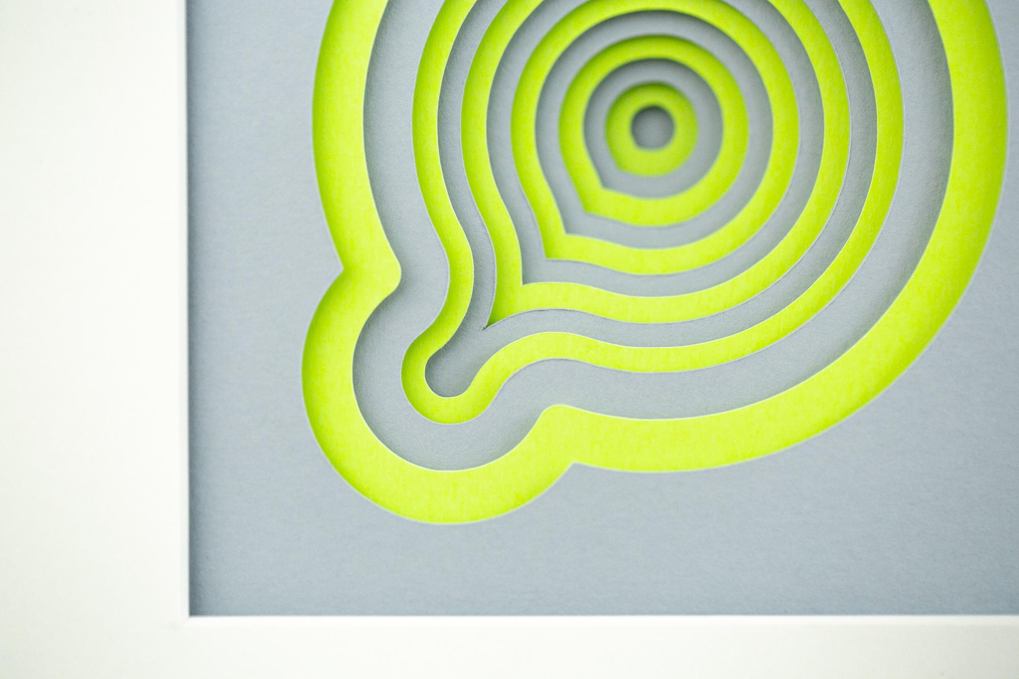 This lime green and grey abstract paper artwork titled 