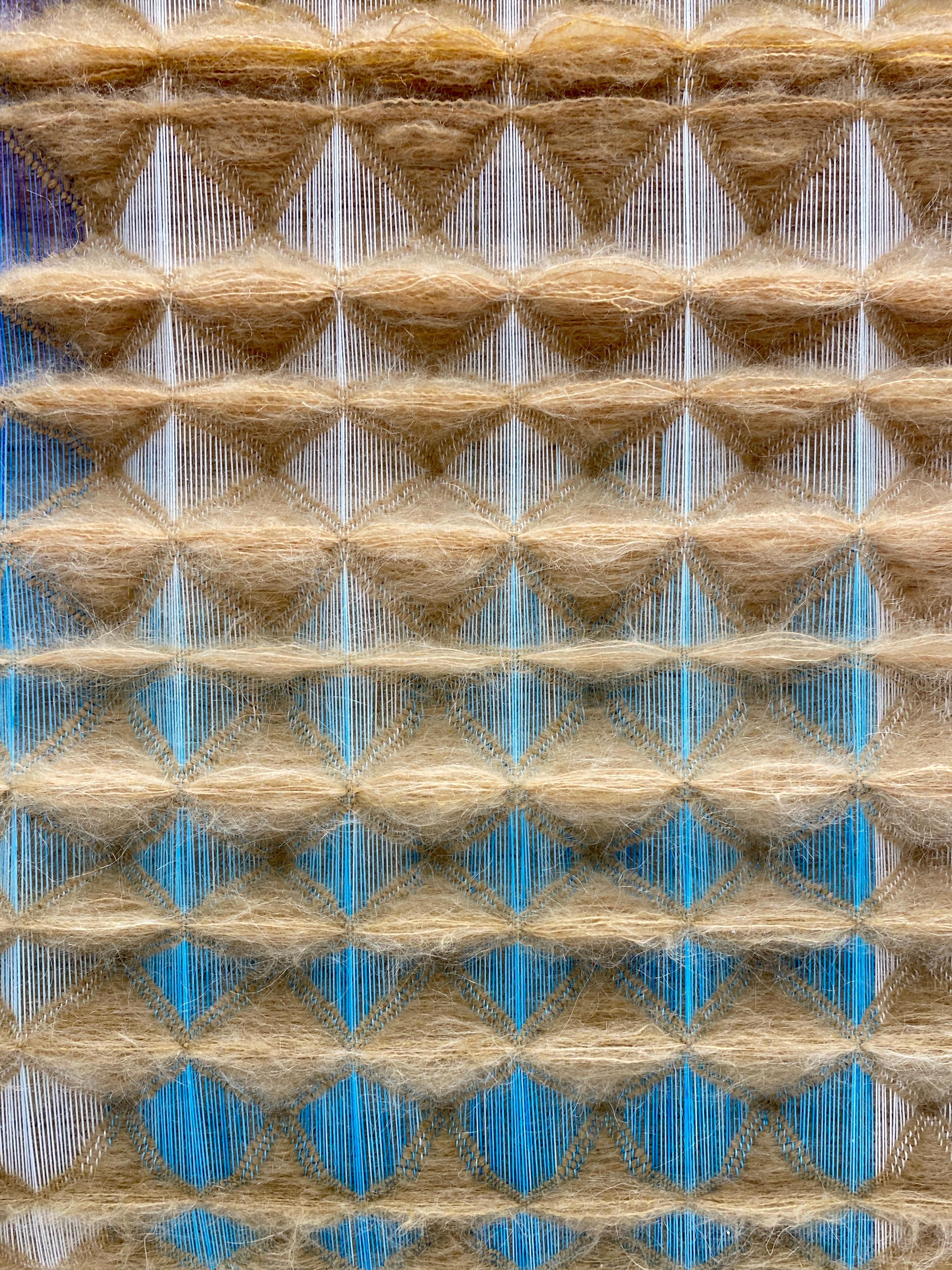 ANYA MOLYVIATIS (b.1994) sculpts visual and tactile landscapes by unifying her love for fibers and design. With color gradients, weaving structures, and materiality, she shapes space into one with depth and motion. Seeking answers to our questions