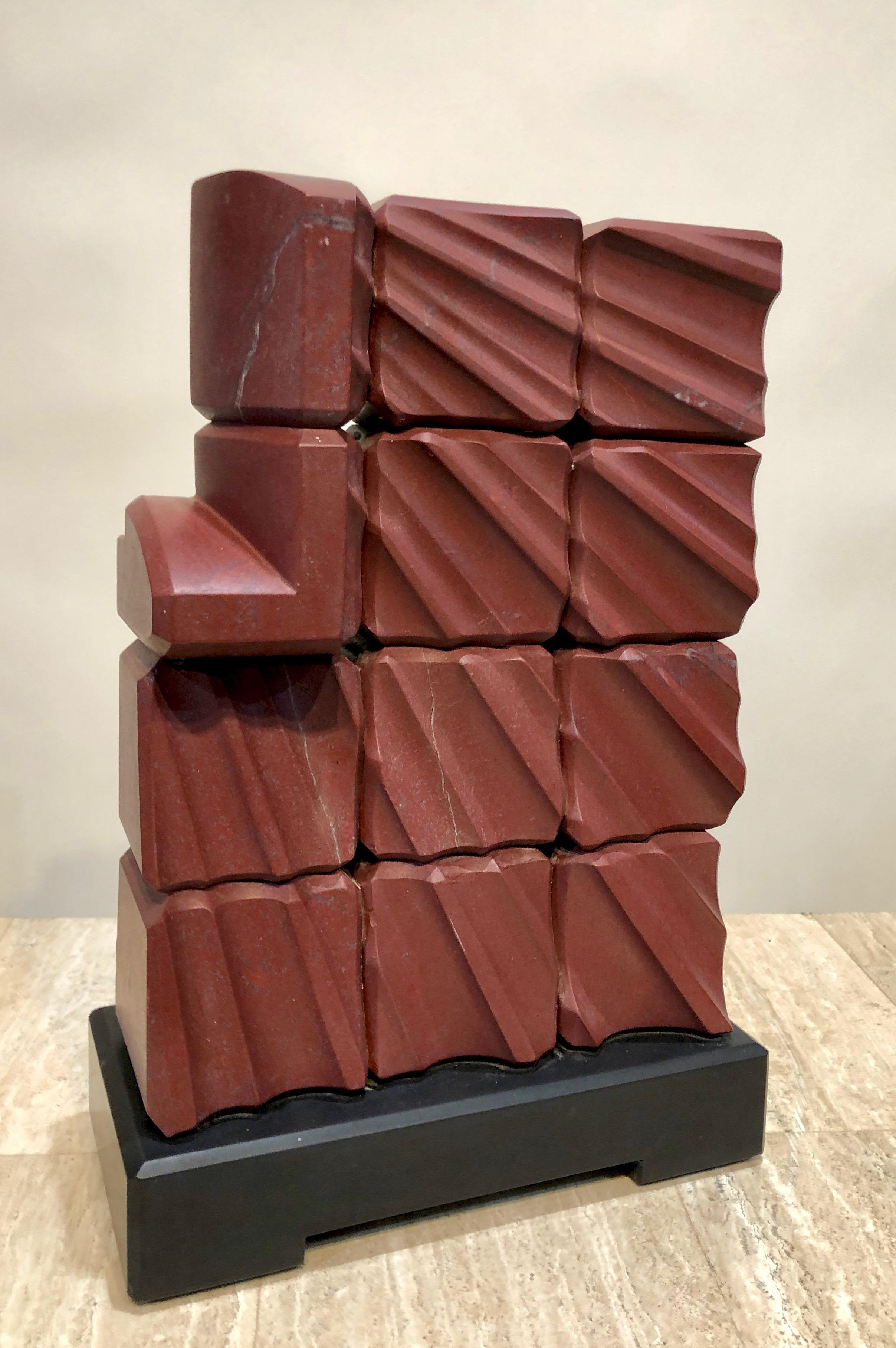 Donald Davis Abstract Sculpture - Red Ray, abstract sculpture, red Turkish Marble, black stone, geometric, carving