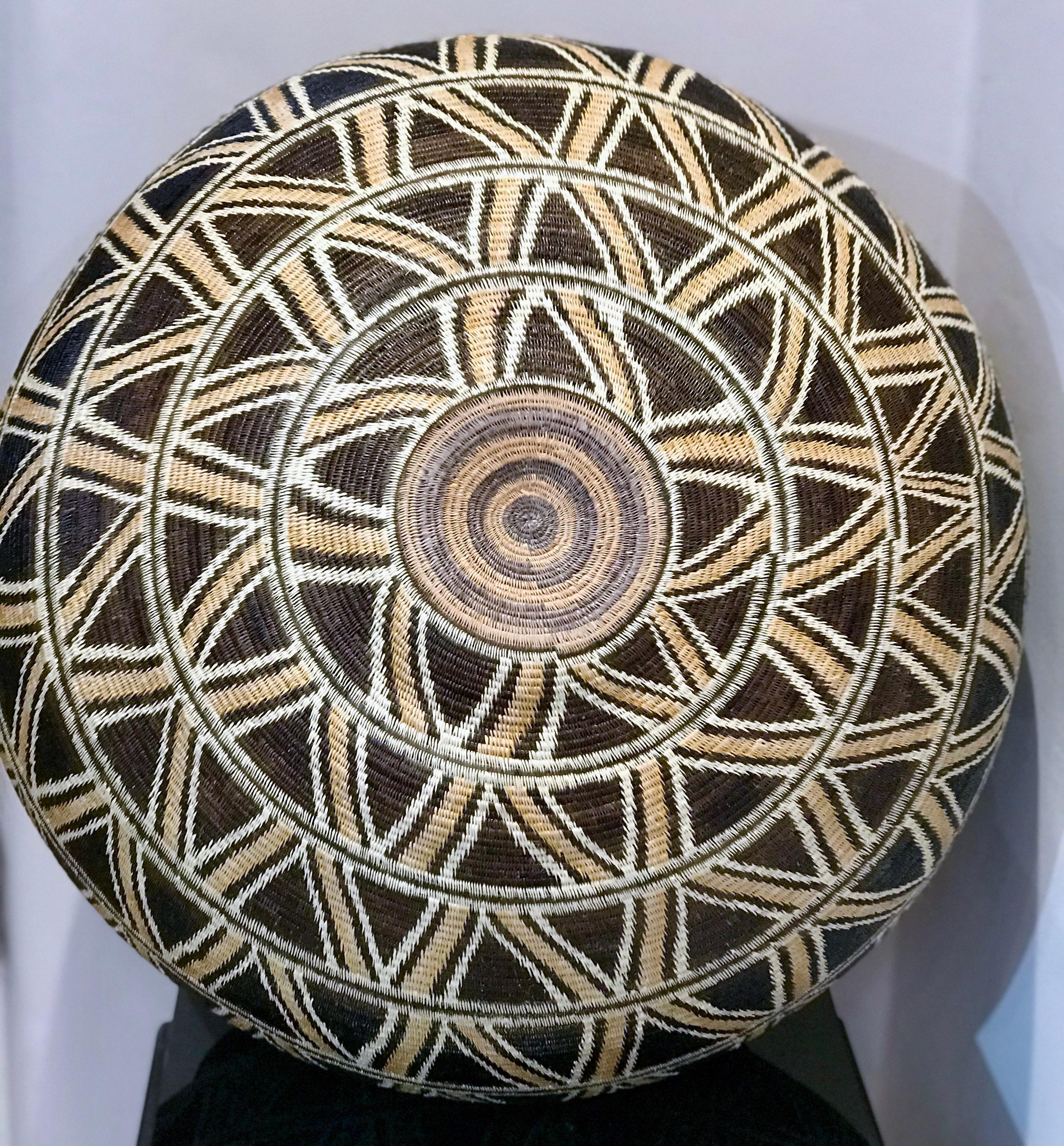 Basket by Elsa Quiros, large geometric design in brown, tan, white sunflower 1